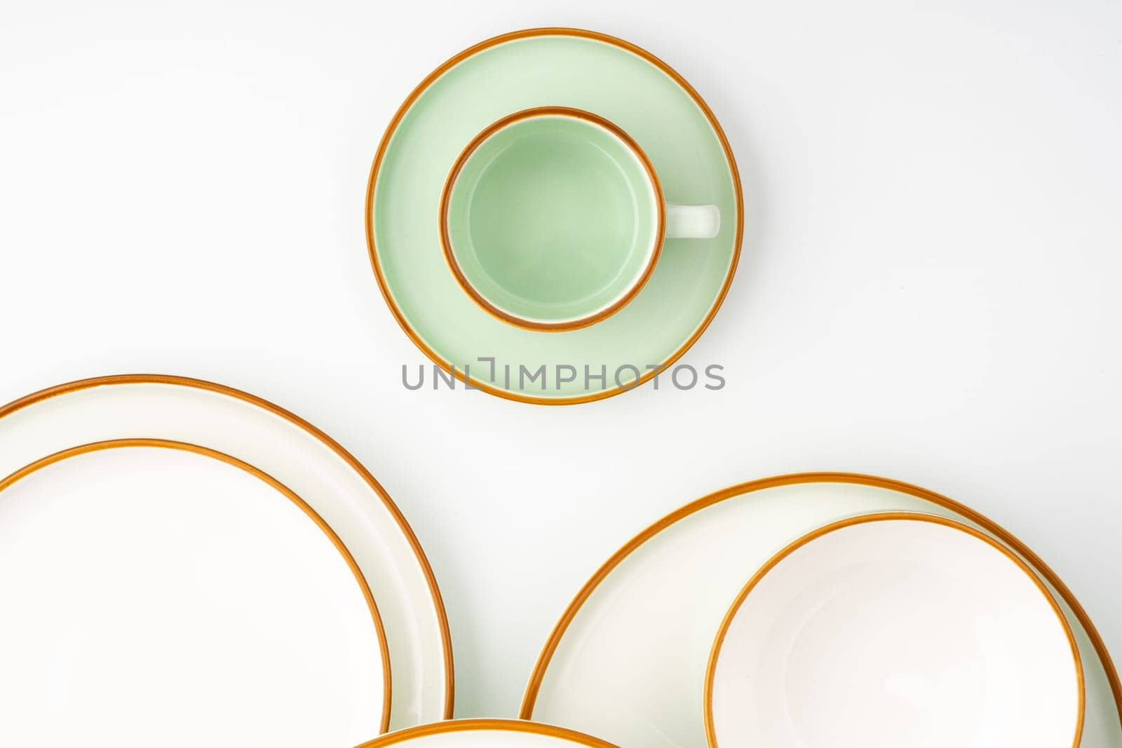 A set of ceramic tableware isolated on white background by A_Karim