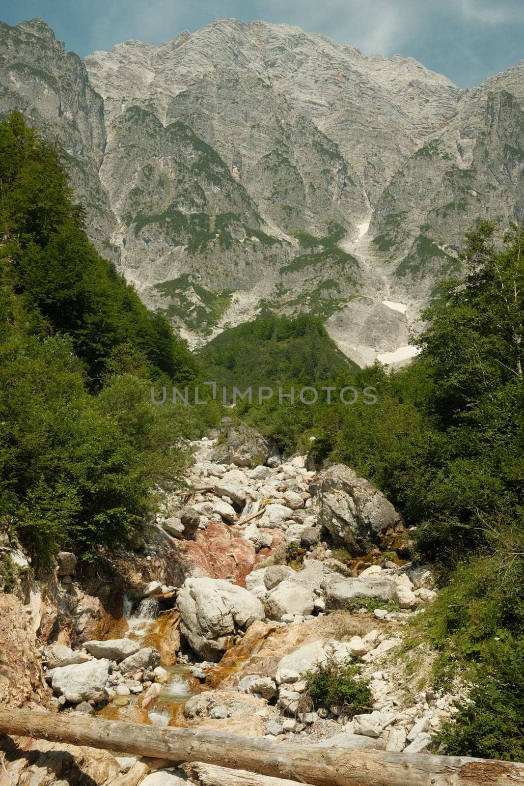 Dry, stony riverbed in summer in the Leogang mountains, Austria