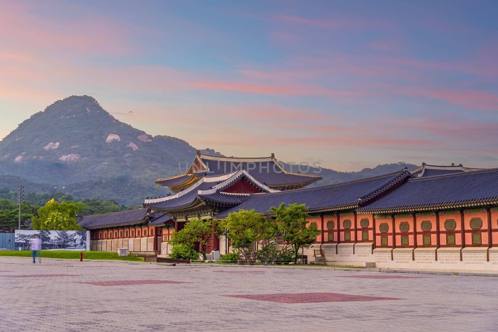 Gyeongbokgung Palace in downtown Seoul at sunset by f11photo