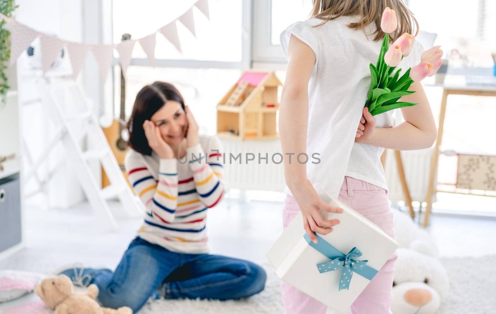 Presenting beautiful gift to happy mother by GekaSkr