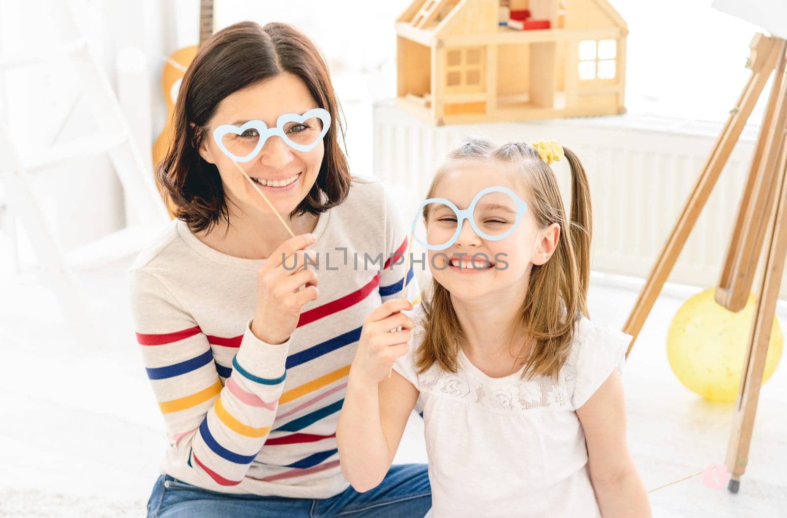 Mother and daughter with stick glasses by GekaSkr