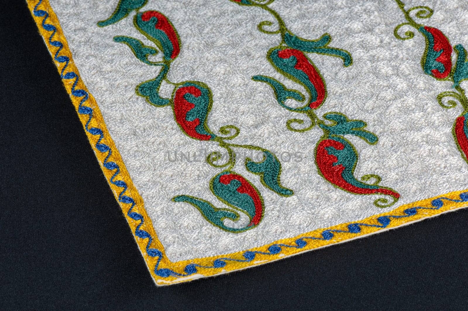 A closeup shot of national ornaments and patterns of Central Asia on a piece of fabric