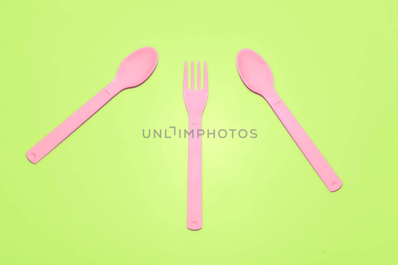 an implement with two or more prongs used for lifting food to the mouth or holding it when cutting