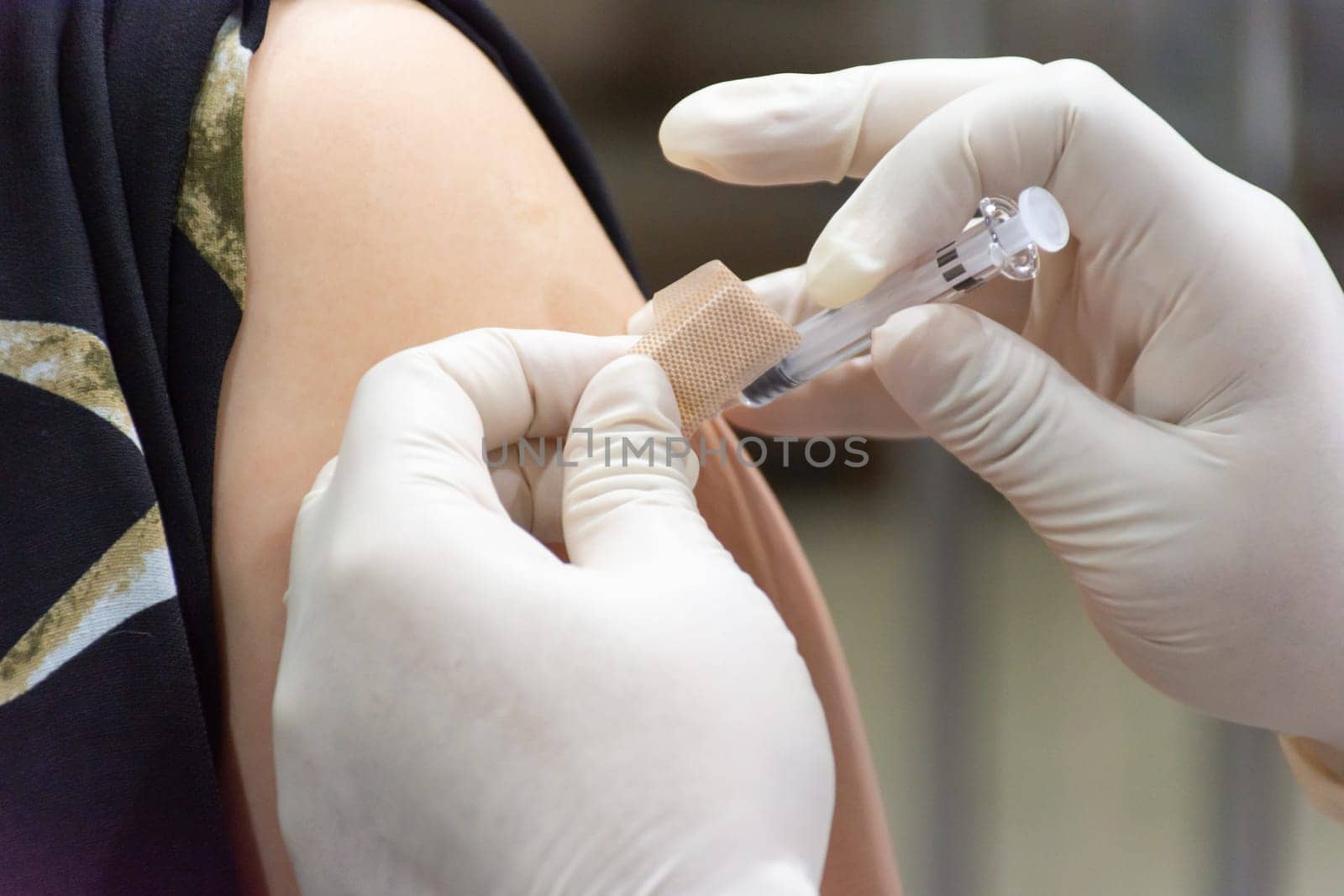 Patient asian woman get vaccinated the flu covid19 by PongMoji