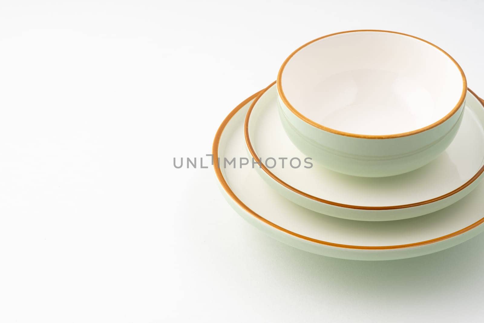 A set of ceramic tableware isolated on white background by A_Karim