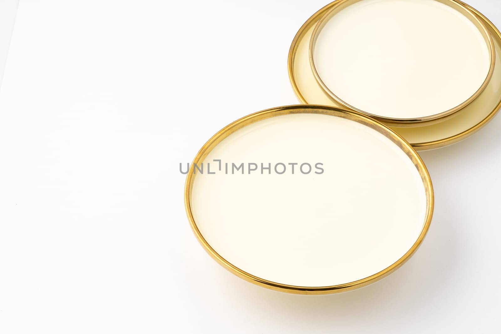 A golden luxury ceramic kitchen utensils on a white background