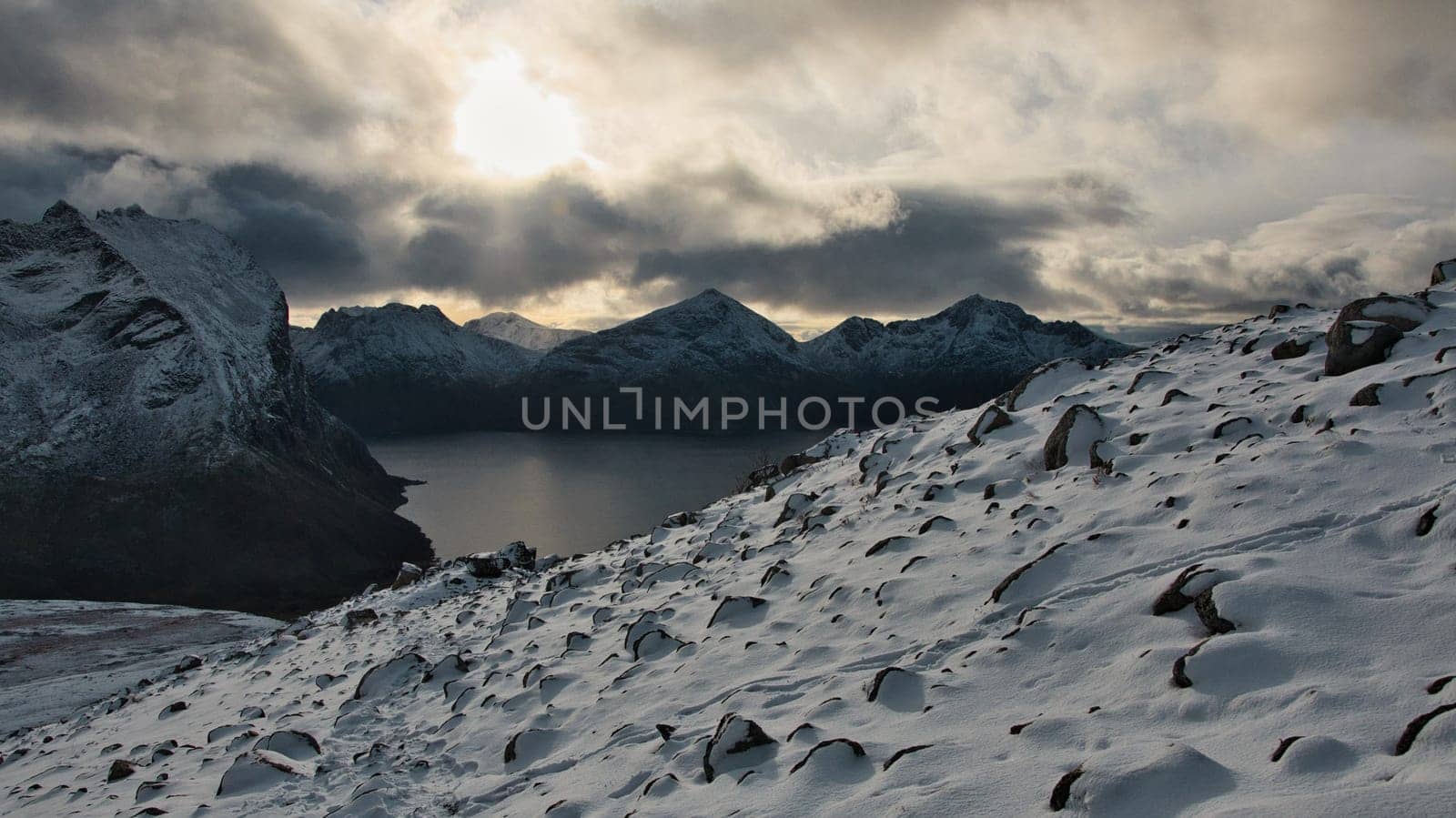 Beautiful view from a steep cliff of a mountain on the coastline of Brosmetinden, Norway