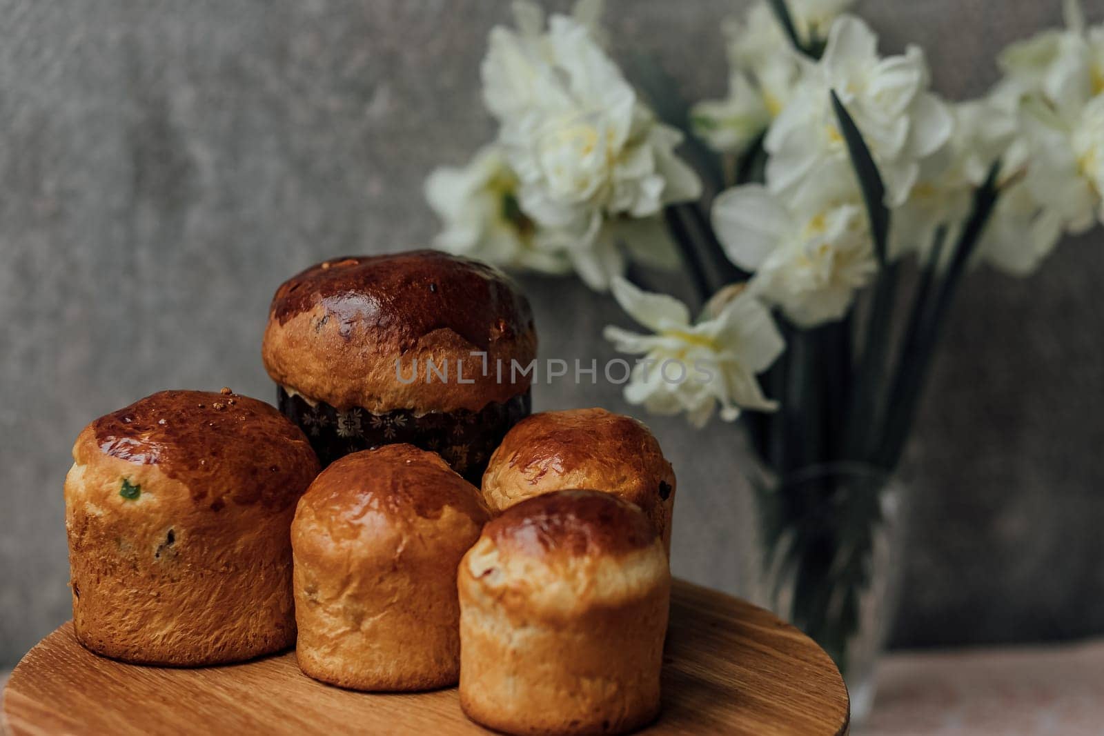 Delicious Easter cake and ingredients on wooden table.