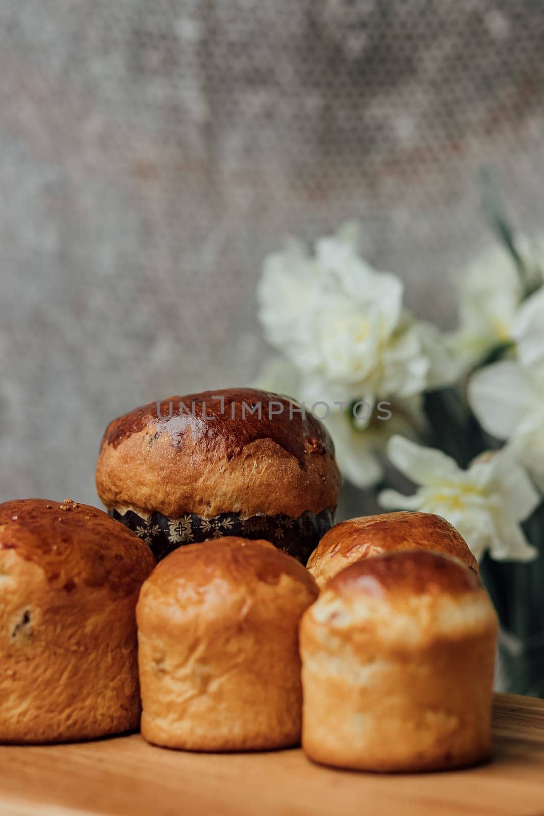 Delicious Easter cake and ingredients on wooden table