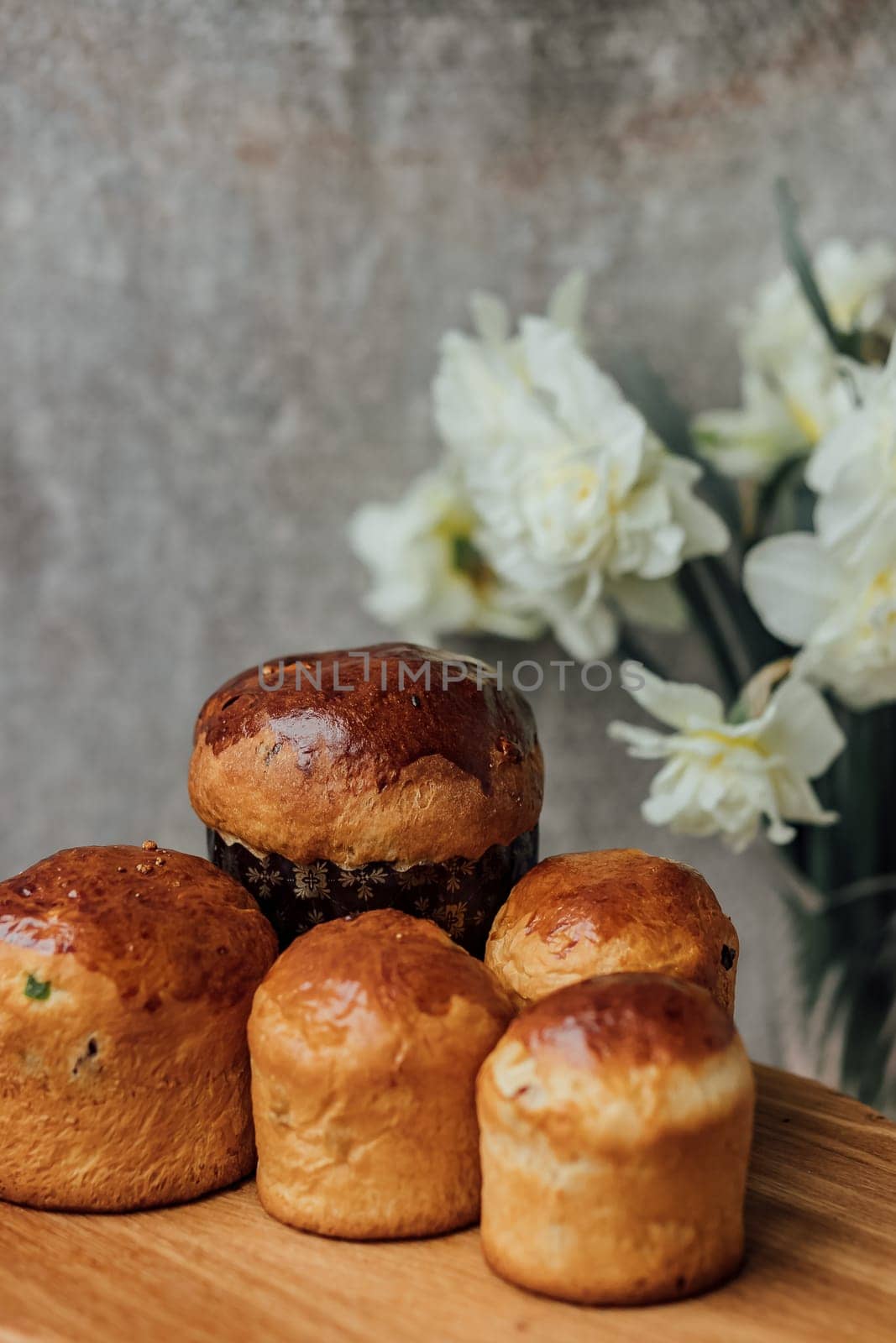 Delicious Easter cake and ingredients on wooden table