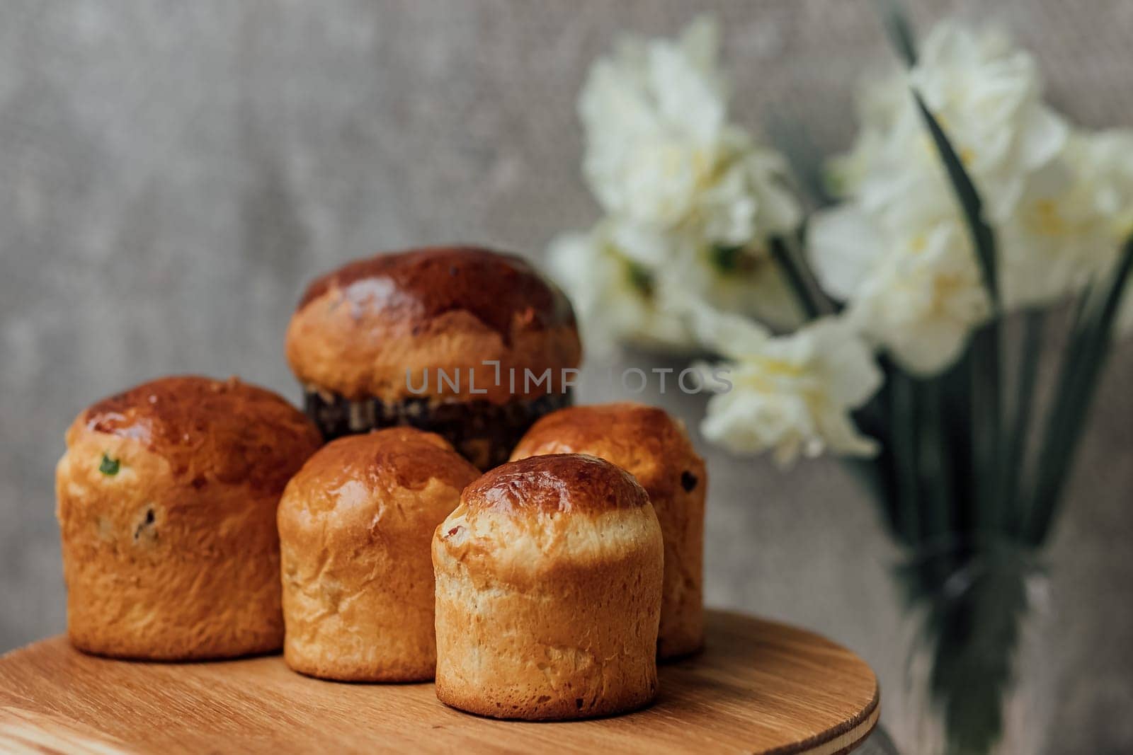 Delicious Easter cake and ingredients on wooden table