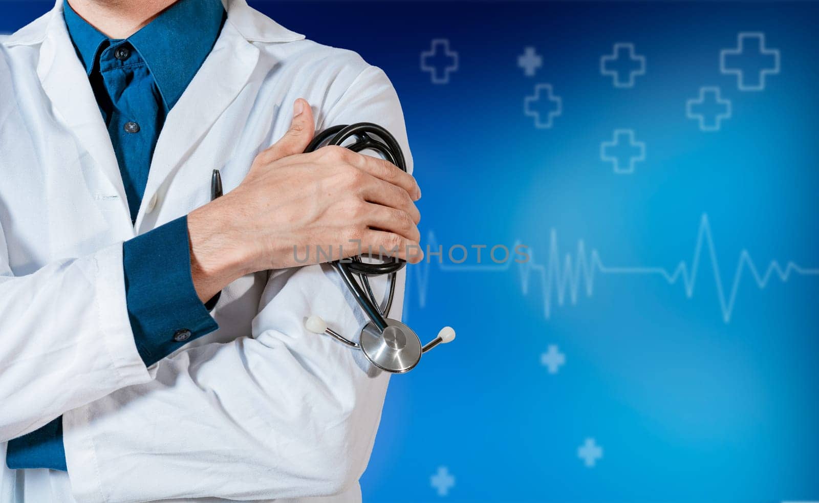 Unrecognizable doctor with stethoscope on isolated background. Doctor arms with stethoscope isolated background by isaiphoto