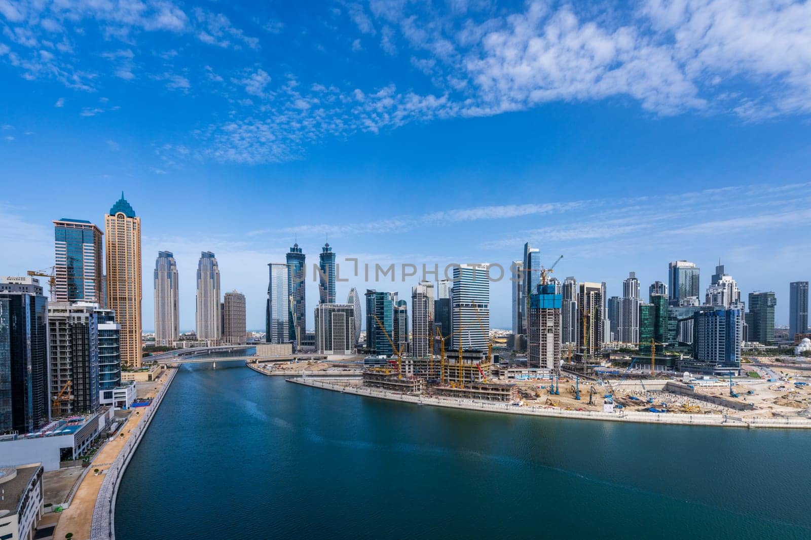 Dubai, UAE - April 1, 2023: Skyline of new construction in downtown district from apartment in Business Bay