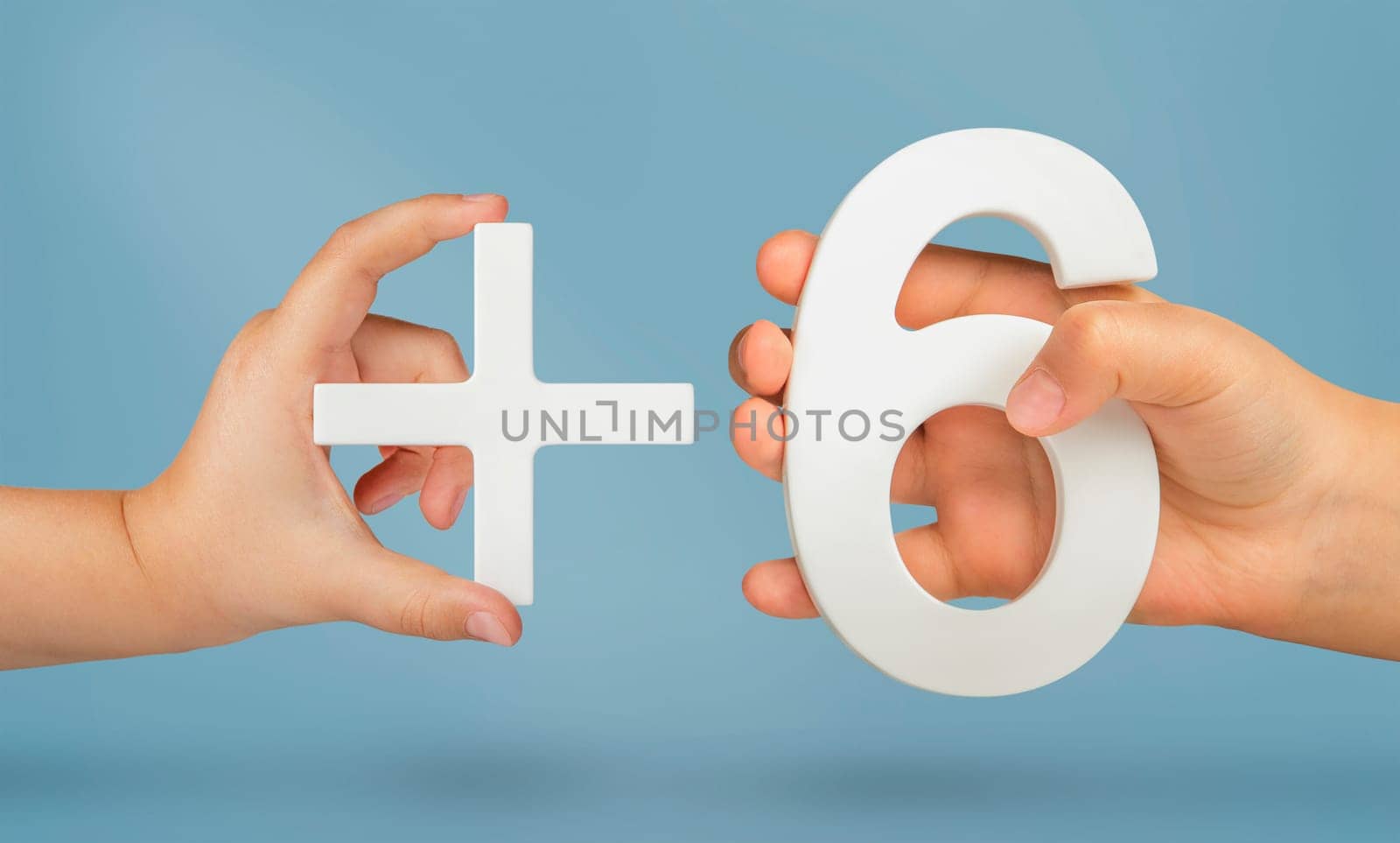 The number six and the plus symbol in the hands of a child on a blue background. White number 6 with a plus close-up. The concept of addition or sum of the number six by SERSOL