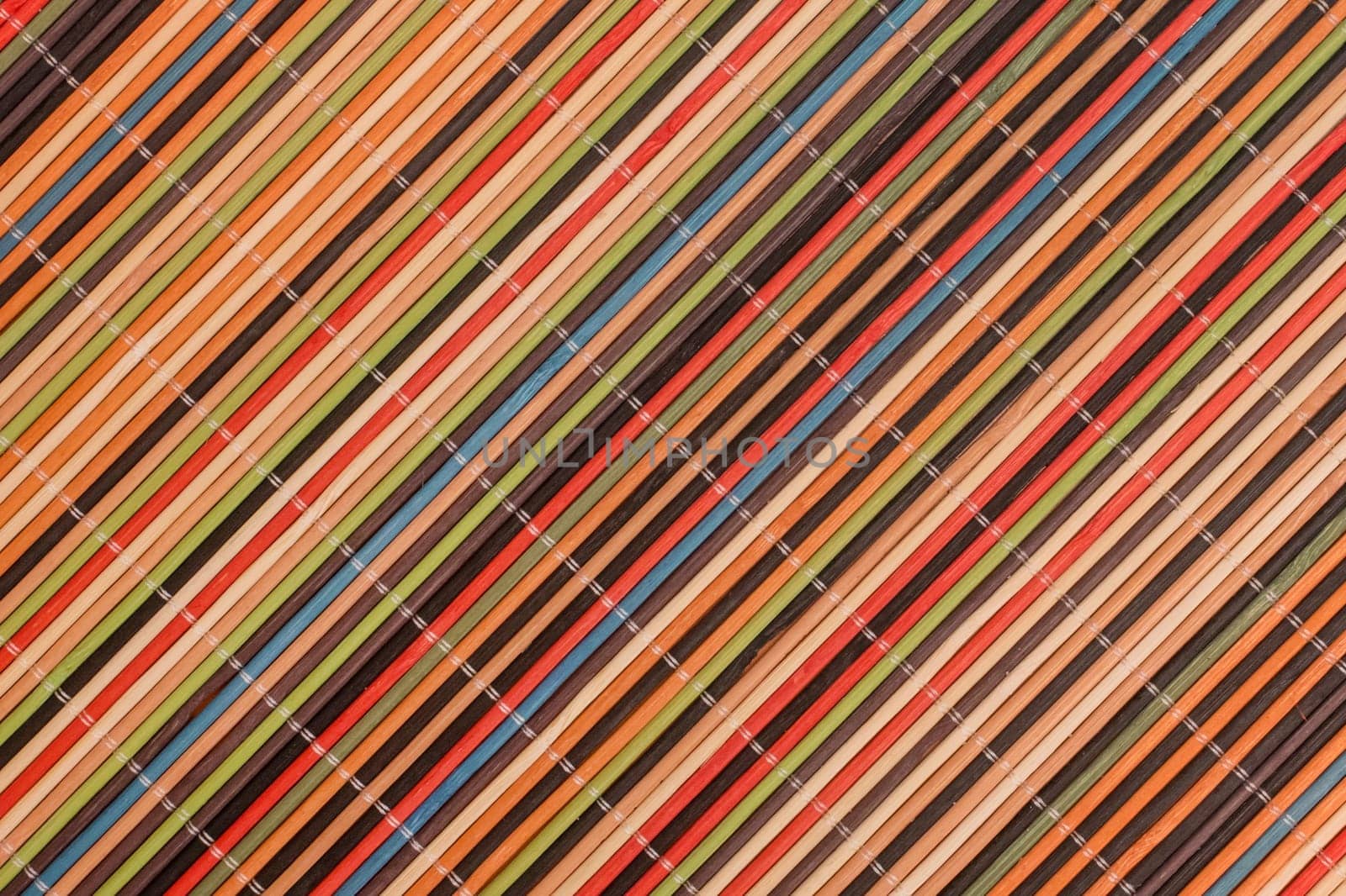 Multicolored Decorative Braided Wood Stand Linear Wicker Striped Shutter Background Blinds Design.