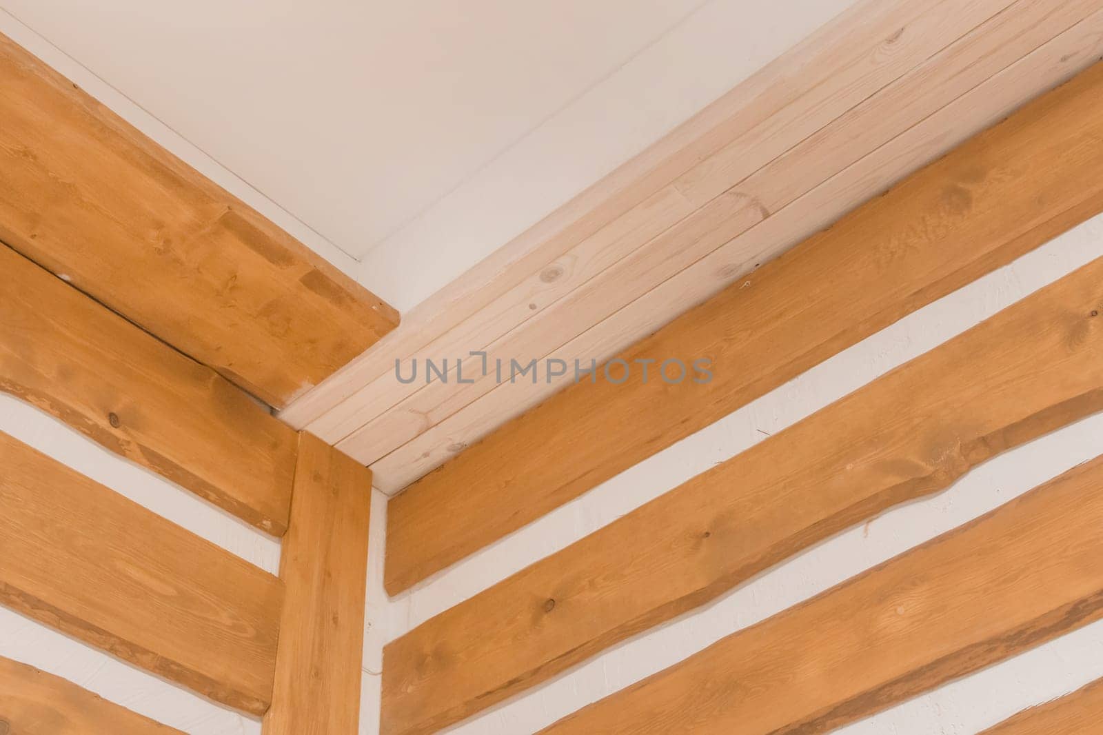 Wooden boards abstract interior plank ceiling design on background of white wall texture by AYDO8