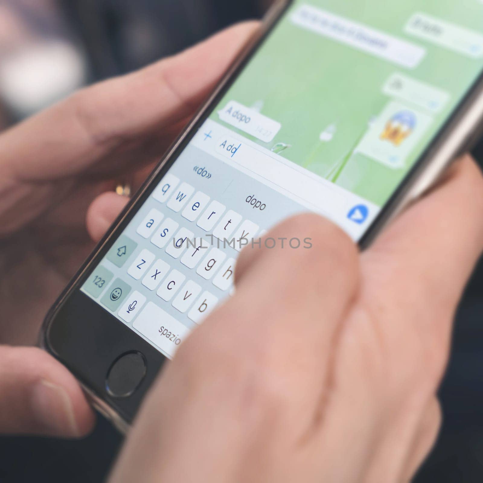 Woman hands using smartphone by germanopoli