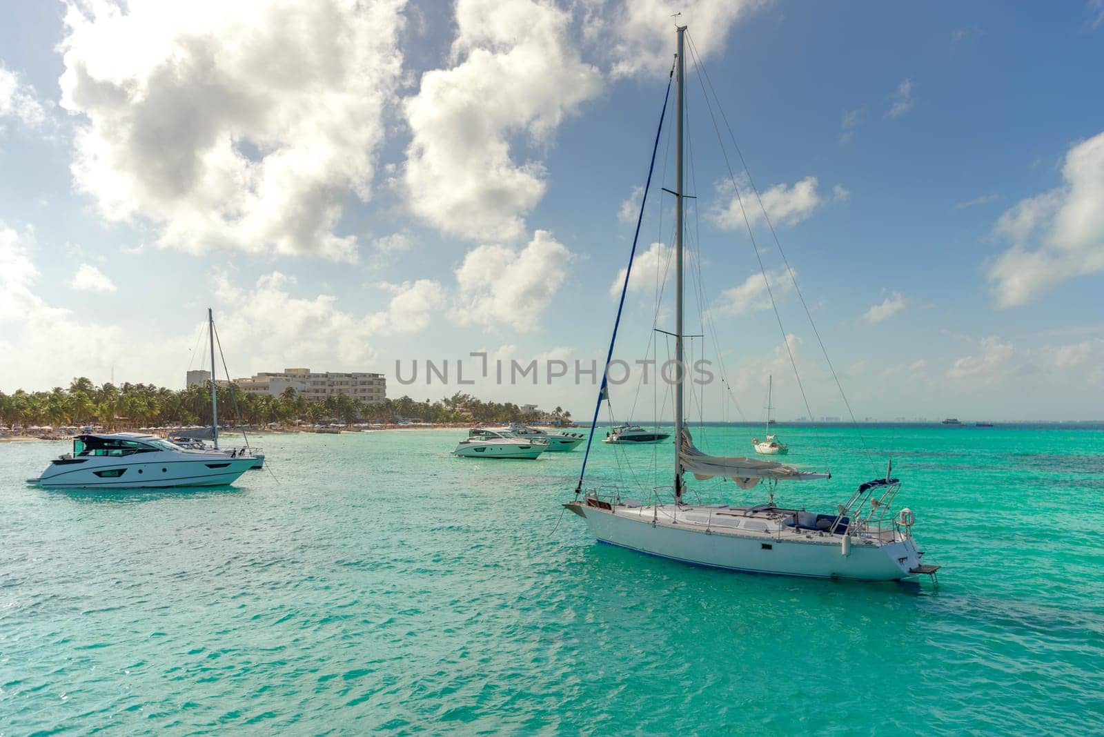 The boat in the Caribbean Sea on a sunny day. Clear water.