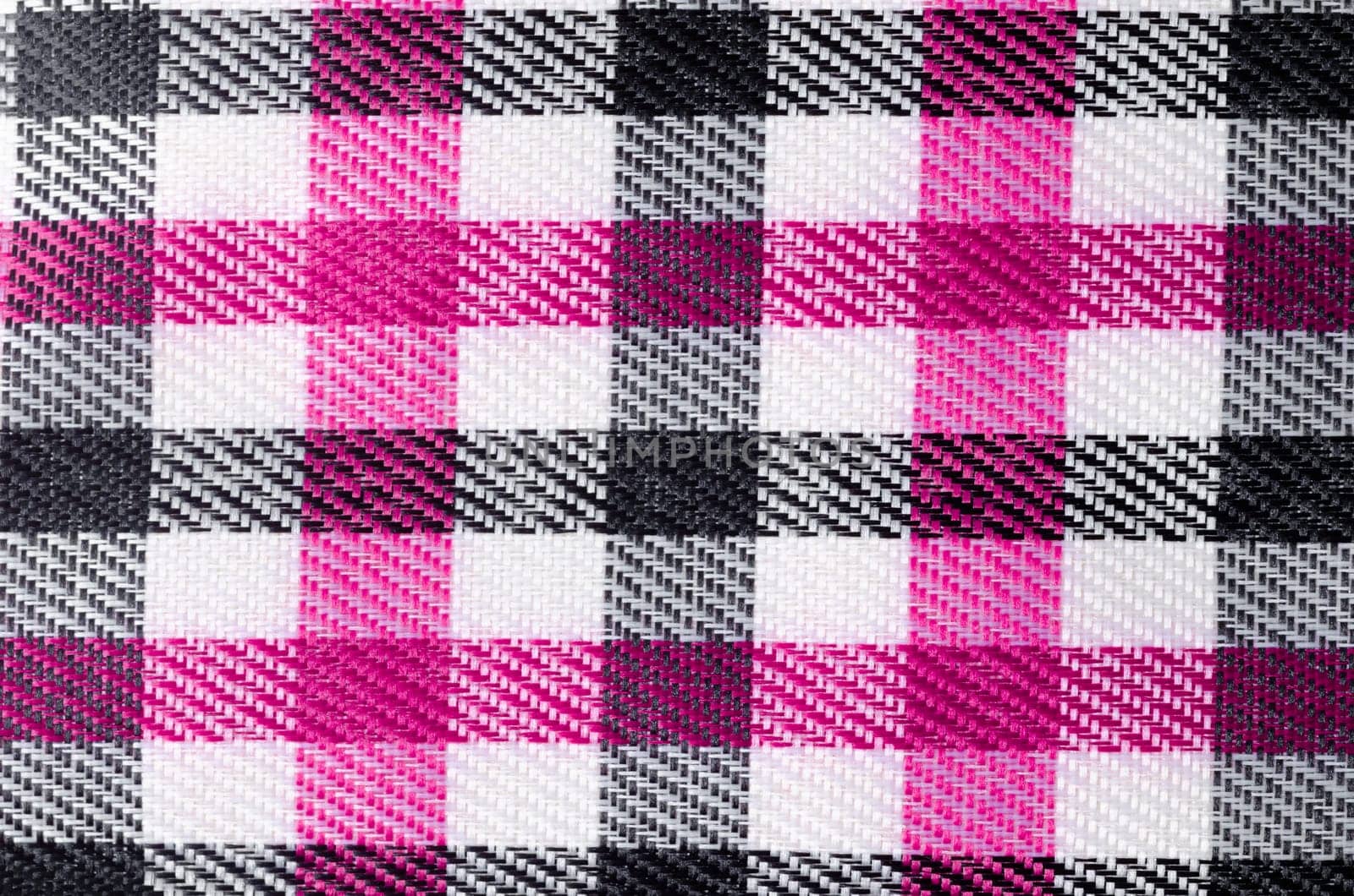 Pink and Black color Gingham pattern fabric texture as background.
Pink and Black color Gingham pattern fabric texture as background.
