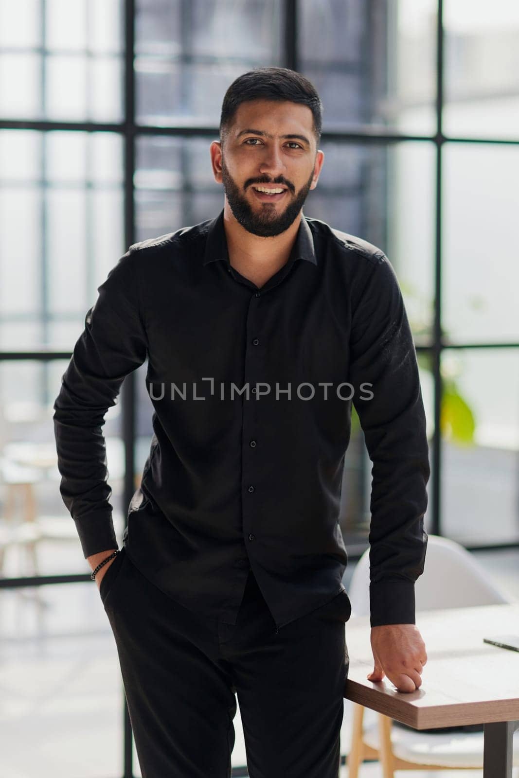 portrait of a young businessman who is smiling