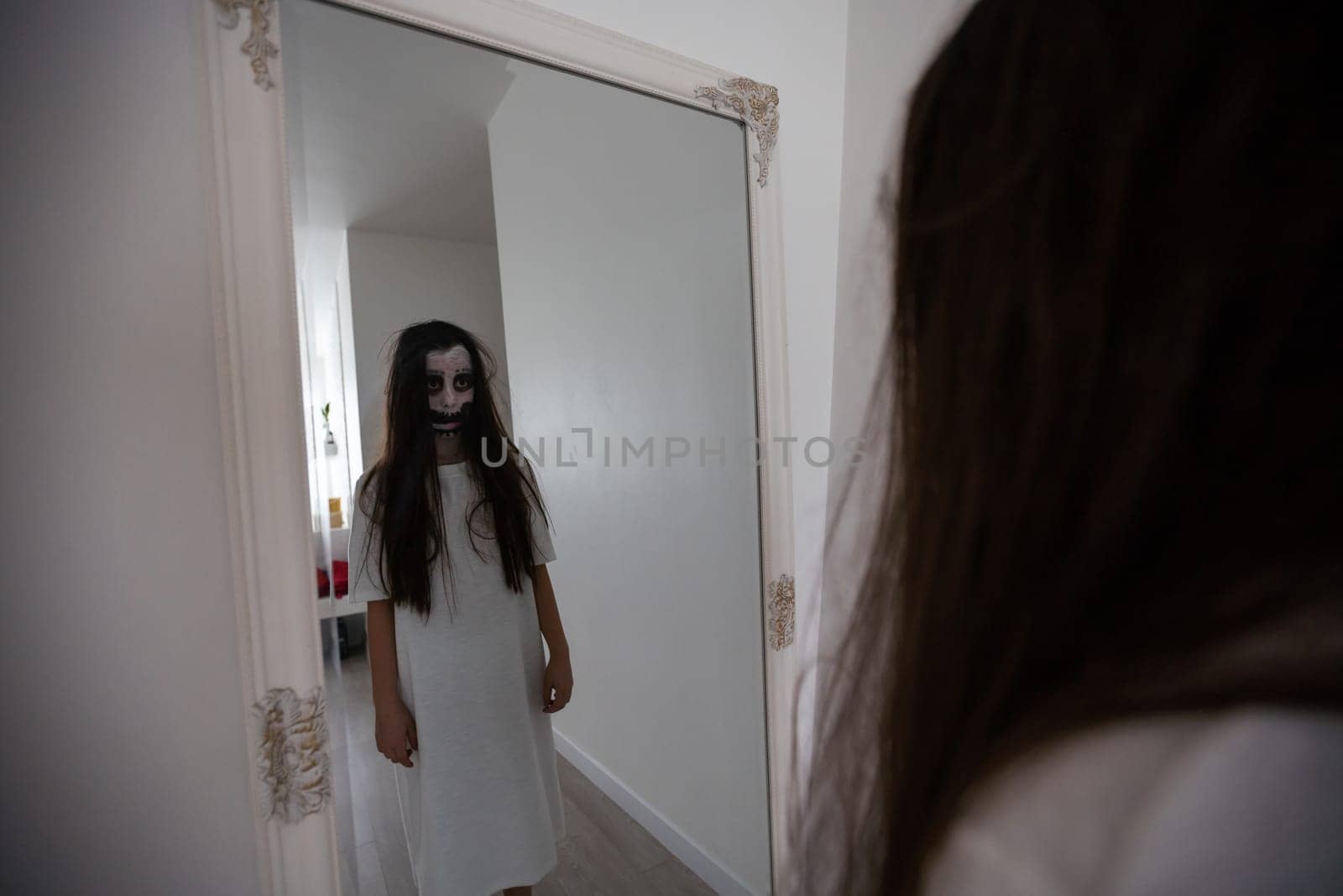 scary girl in white dress from horror film.