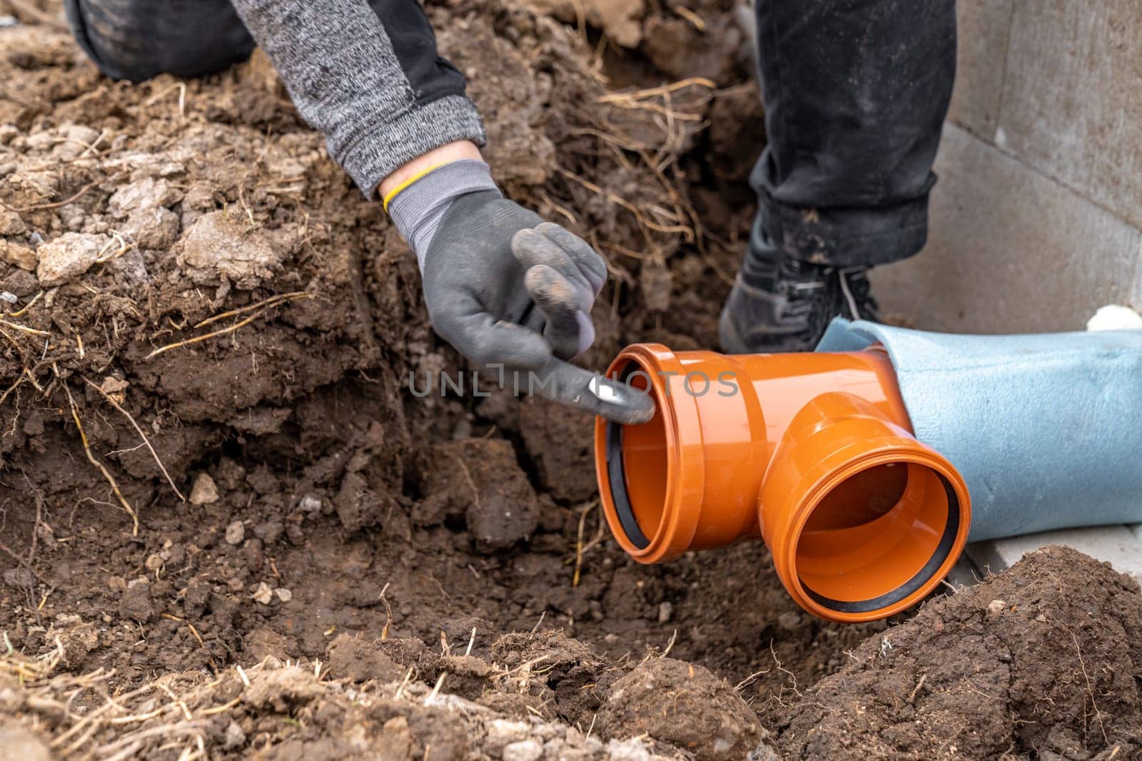 plastic pvc waste sewer pipe in the ground. High quality photo