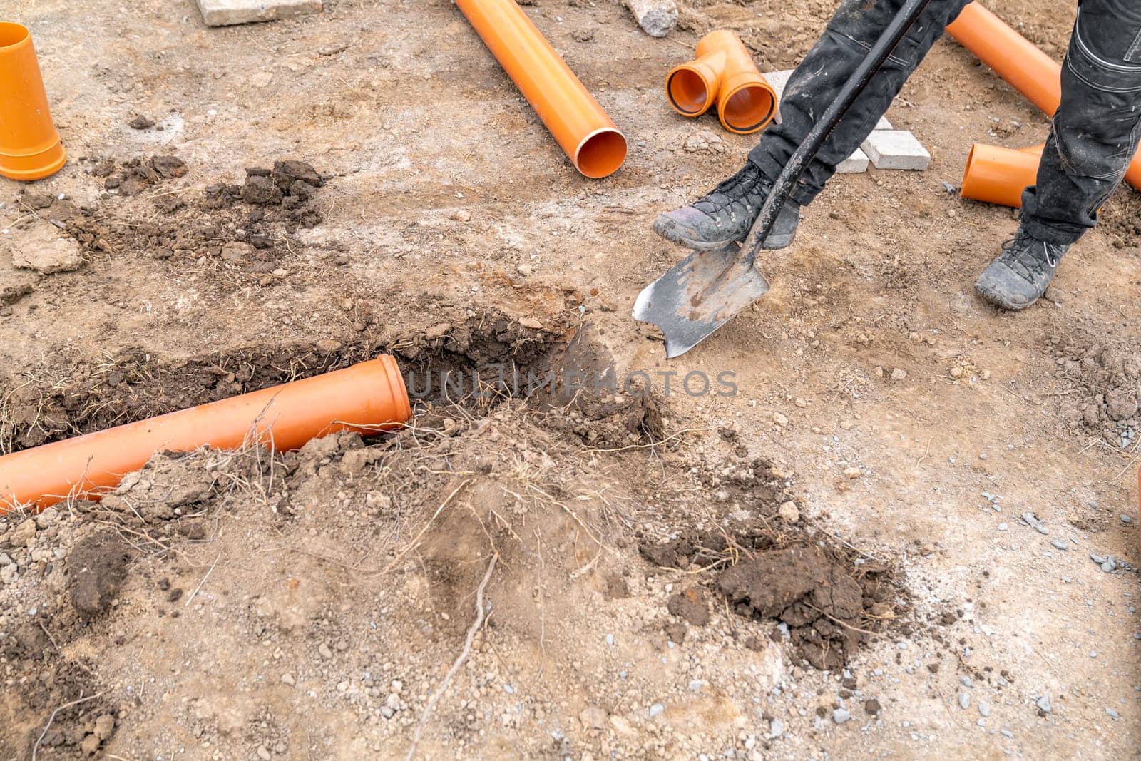 plastic pvc waste sewer pipe in the ground. High quality photo