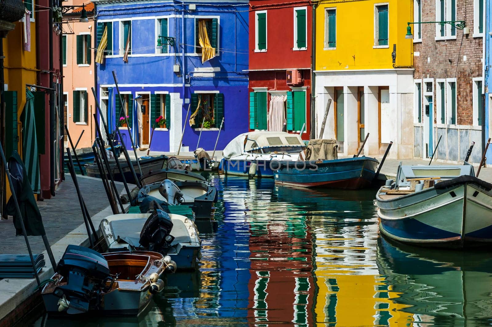 The island of Burano in the Venetian lagoon famous for its brightly colored houses