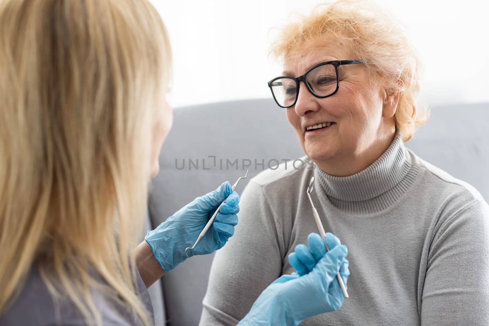 Female dentist and her patient