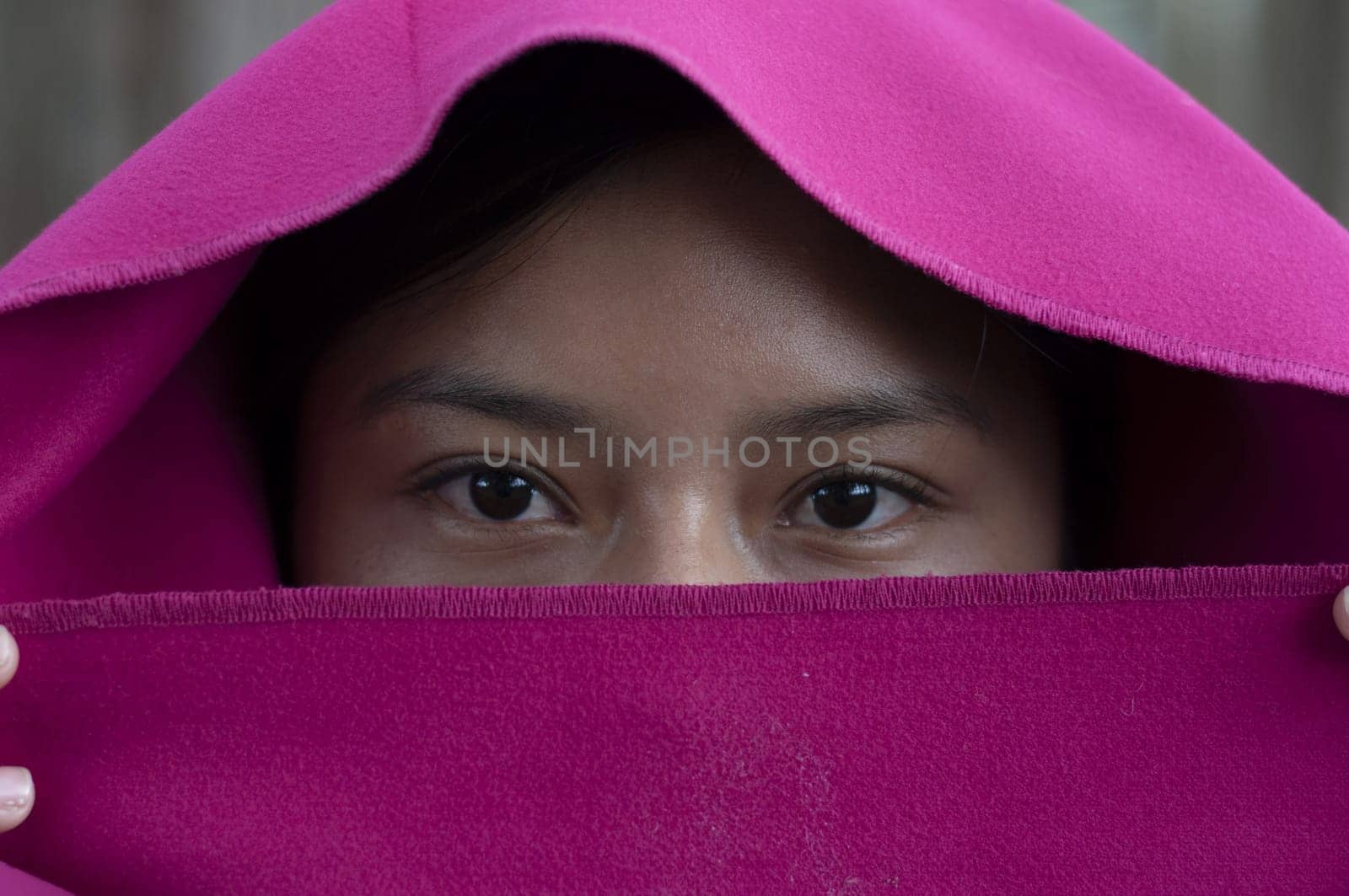 closeup of the eyes of a muslim woman covered with a cloak. High quality photo