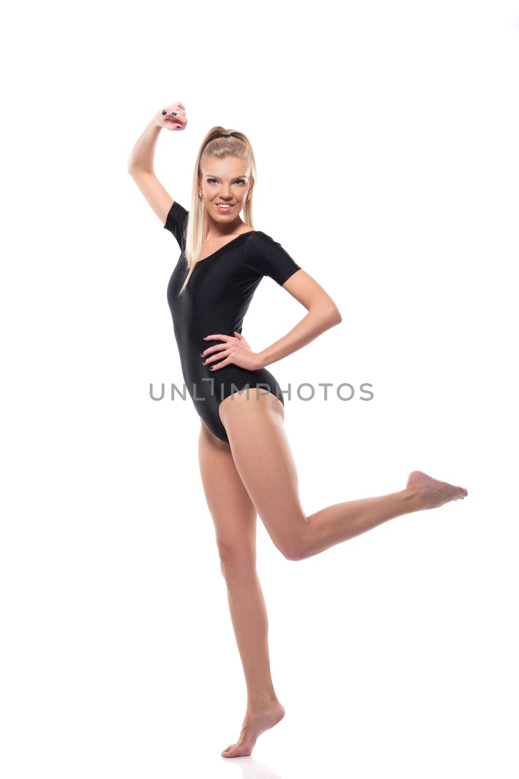 Image of attractive fitness girl posing in leotard, isolated on white
