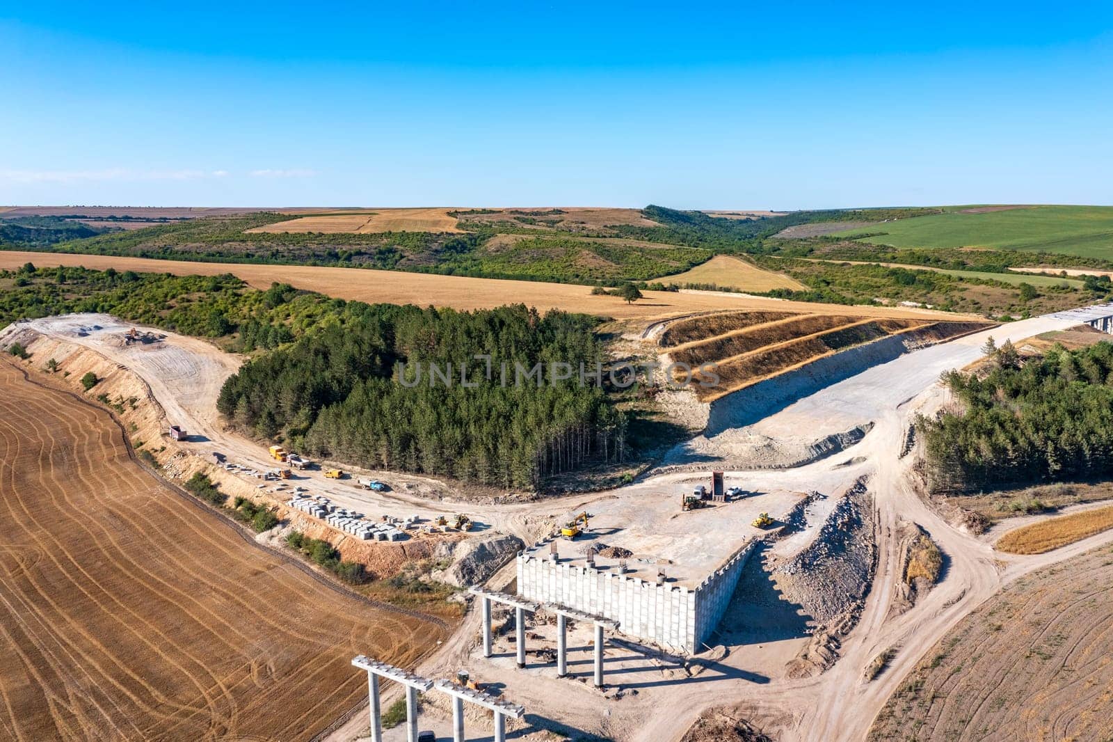 Construction of a new road and bridge.Concrete new bridge supports.