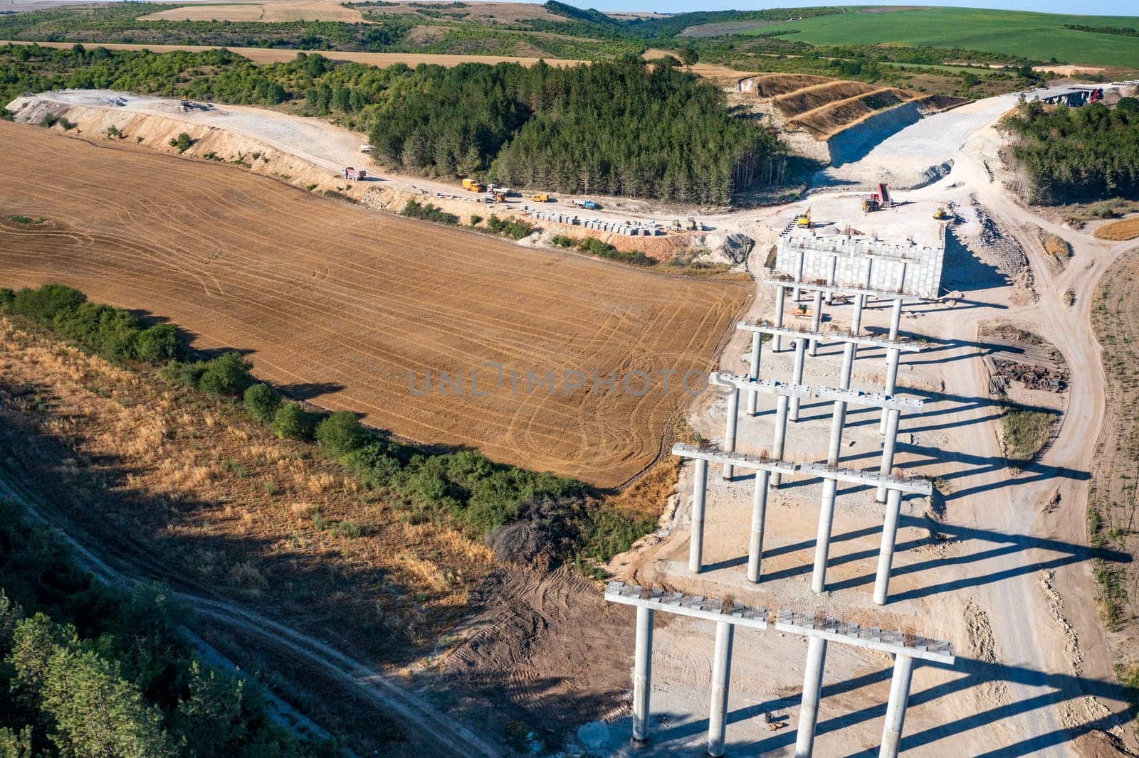 Construction of a new road and bridge.Concrete new bridge supports.