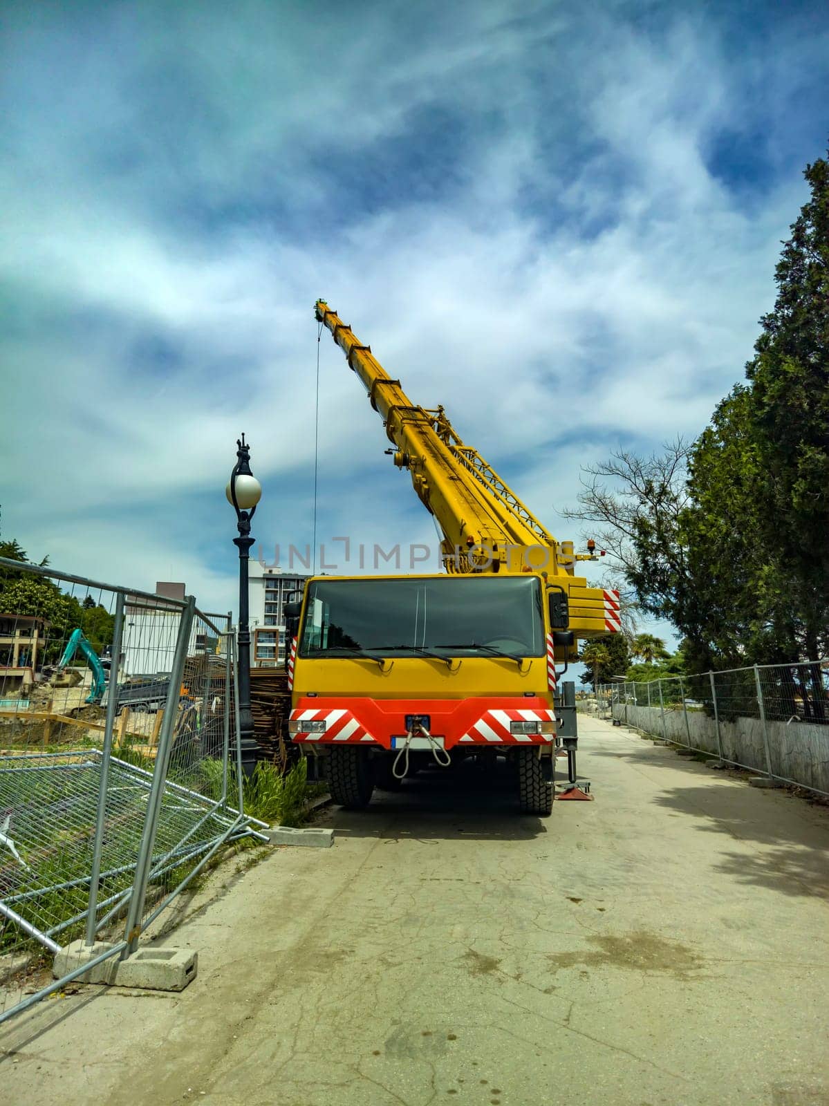 Mobile crane at construction site heavy truck big