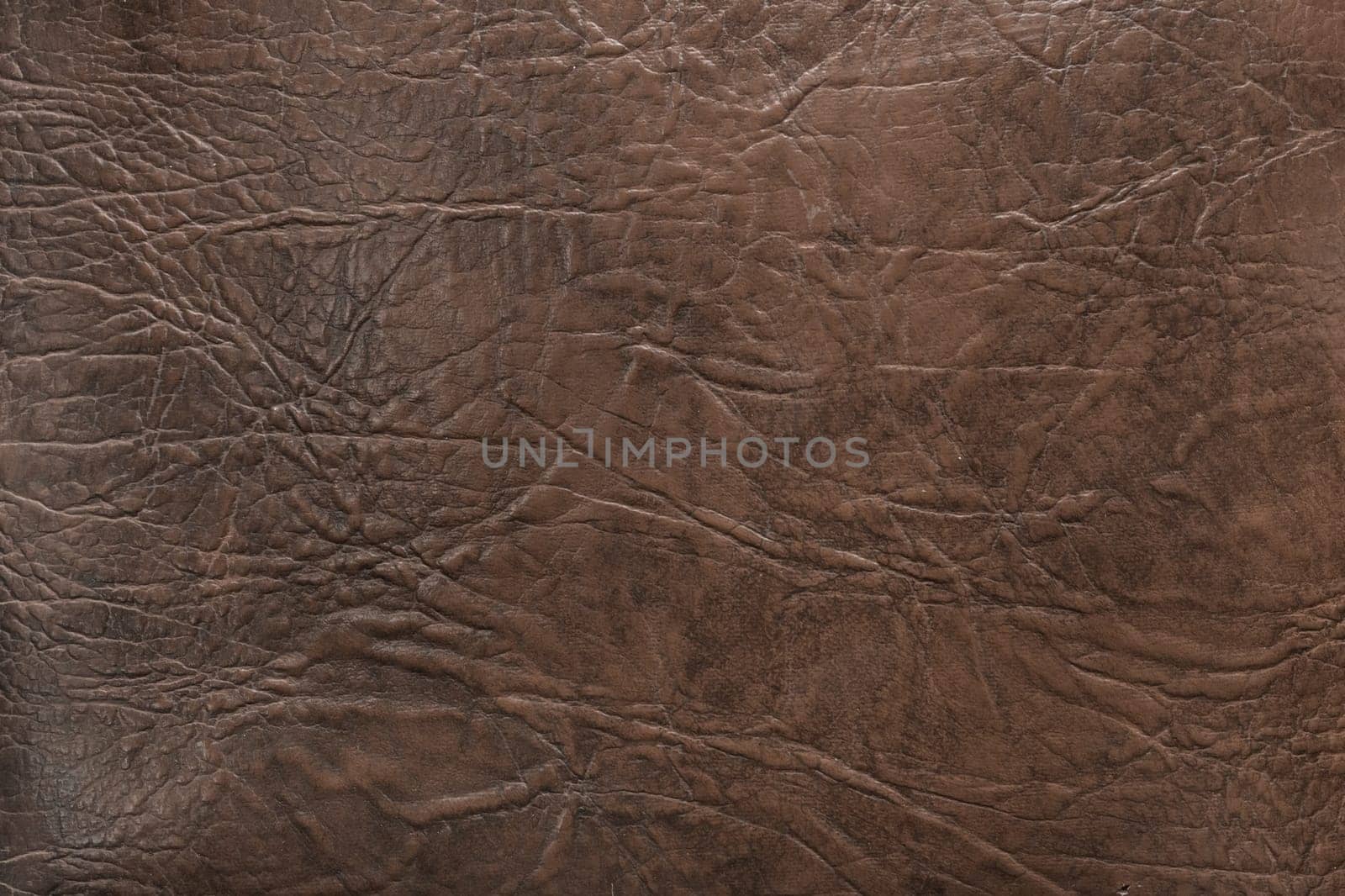 Brown Artifical Leather Cracked Abstract Upholstery Pattern Old Texture Background Surface Vintage.