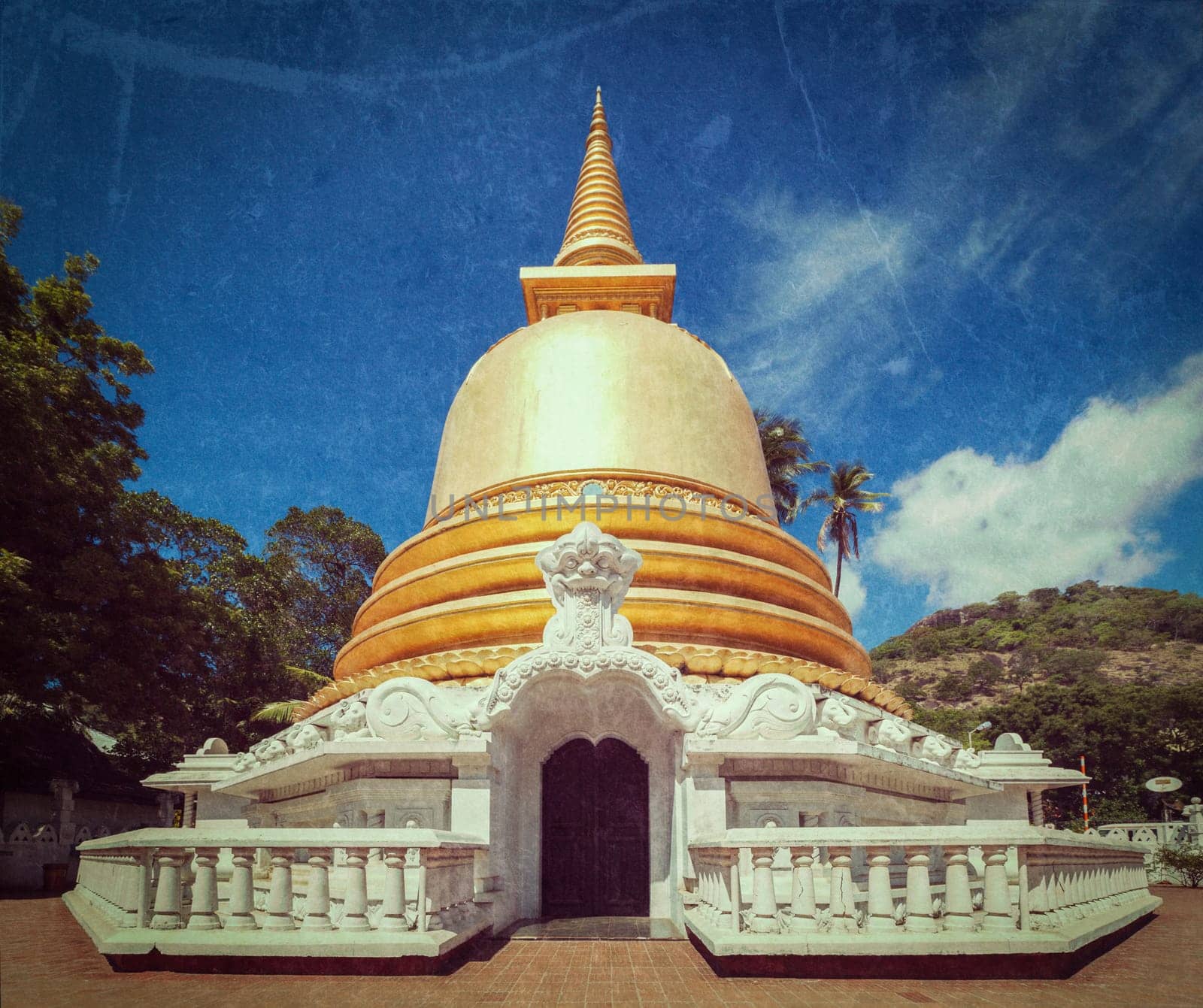 Vintage retro hipster style travel image of buddhist dagoba (stupa) close up with grunge texture overlaidin Golden Temple, Dambulla, Sri Lanka