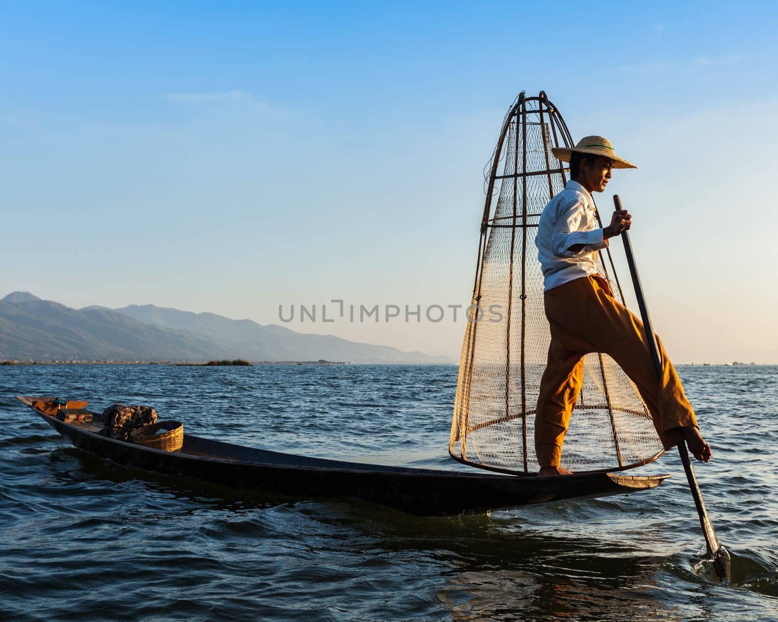 Traditional Burmese fisherman at Inle lake by dimol