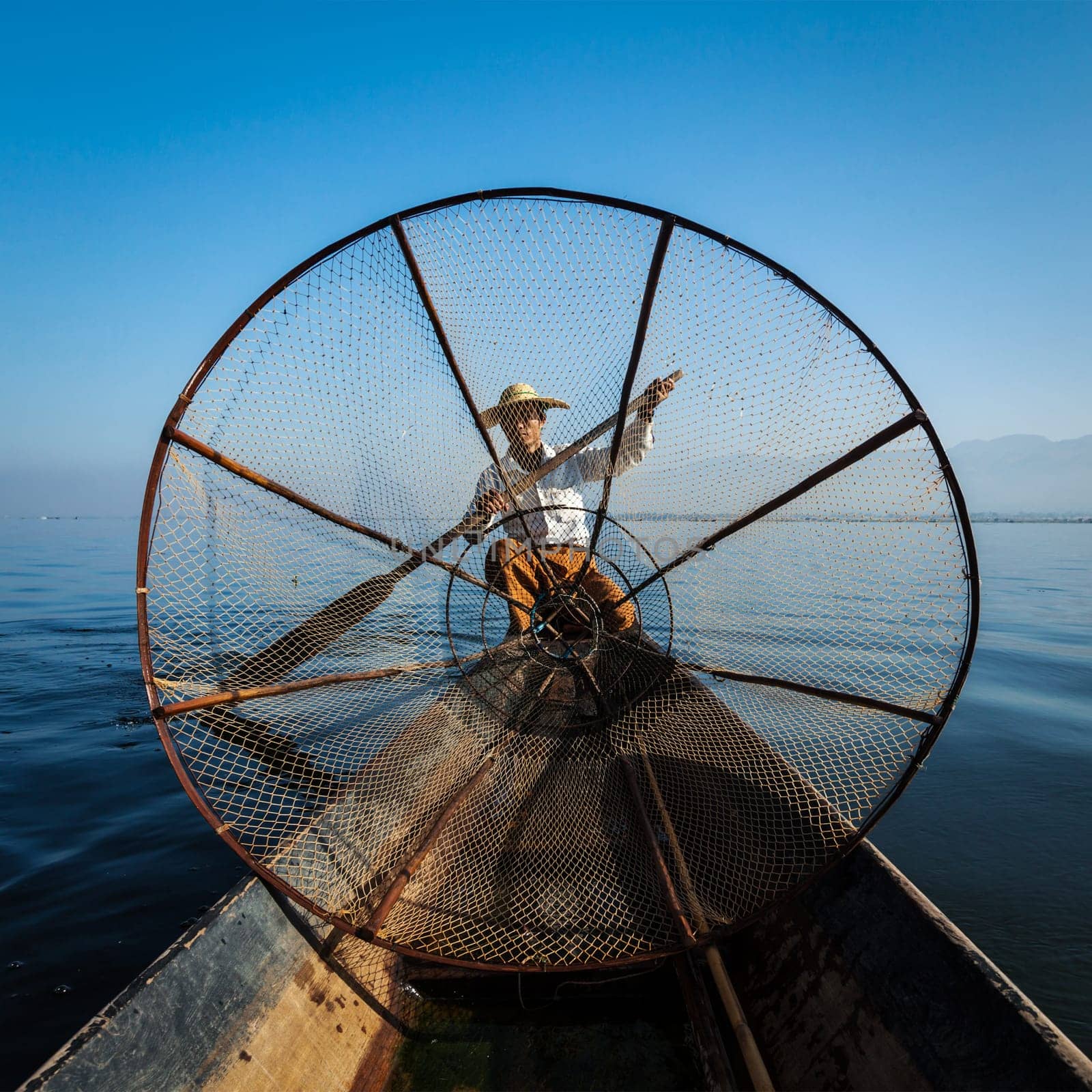 Burmese fisherman at Inle lake, Myanmar by dimol