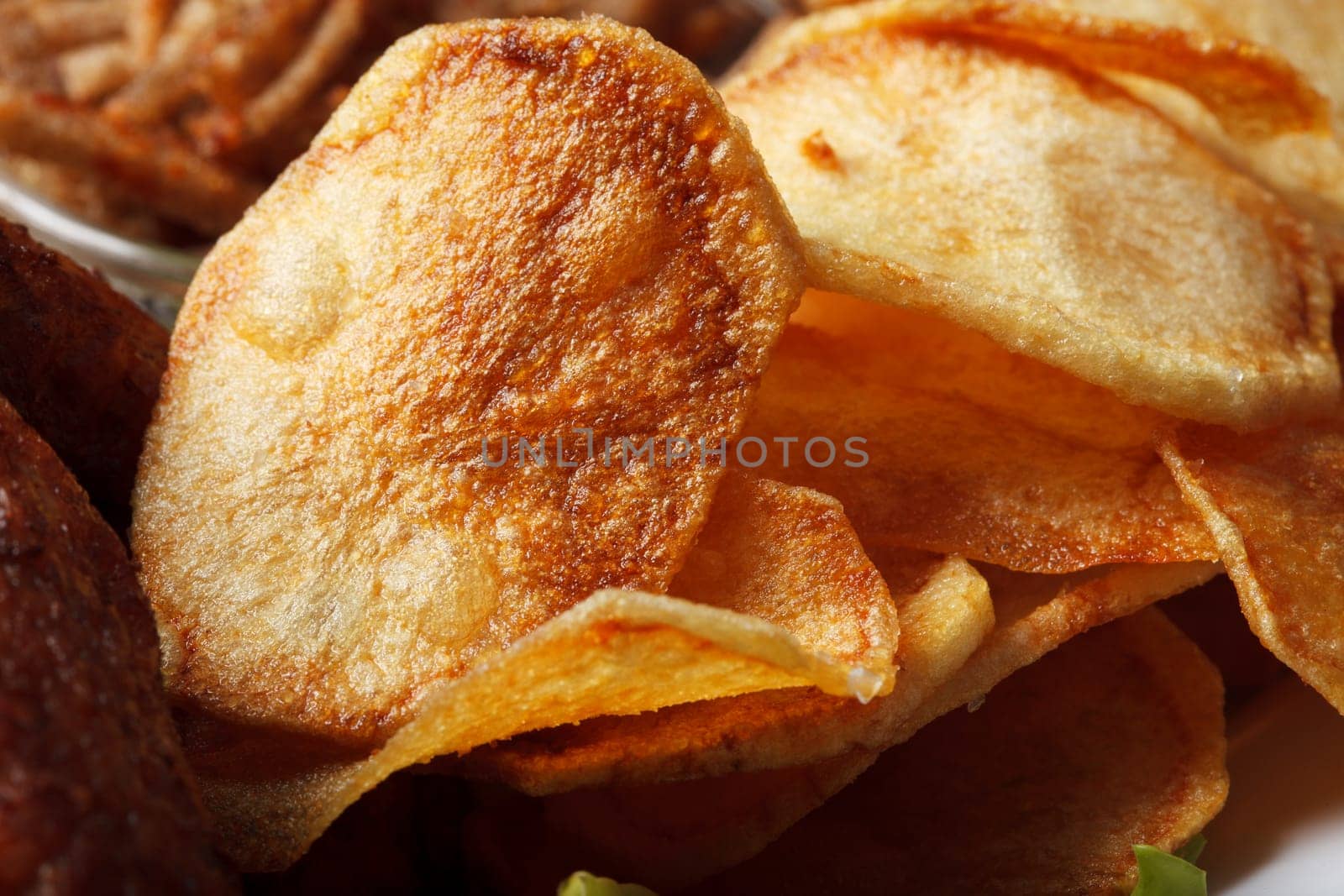 Image of golden crispy chips, close-up