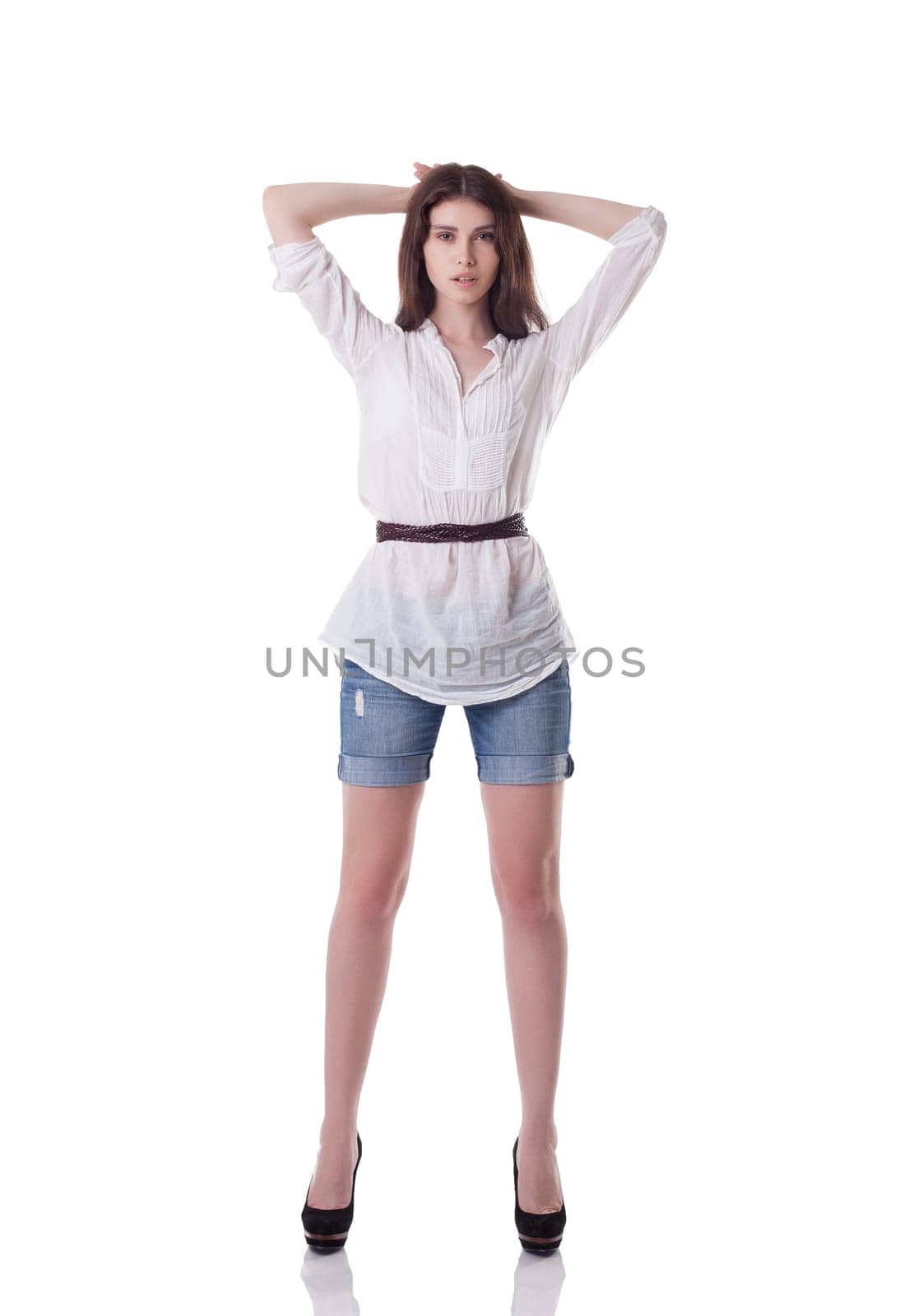 Image of tall brunette posing in casual clothes, isolated on white