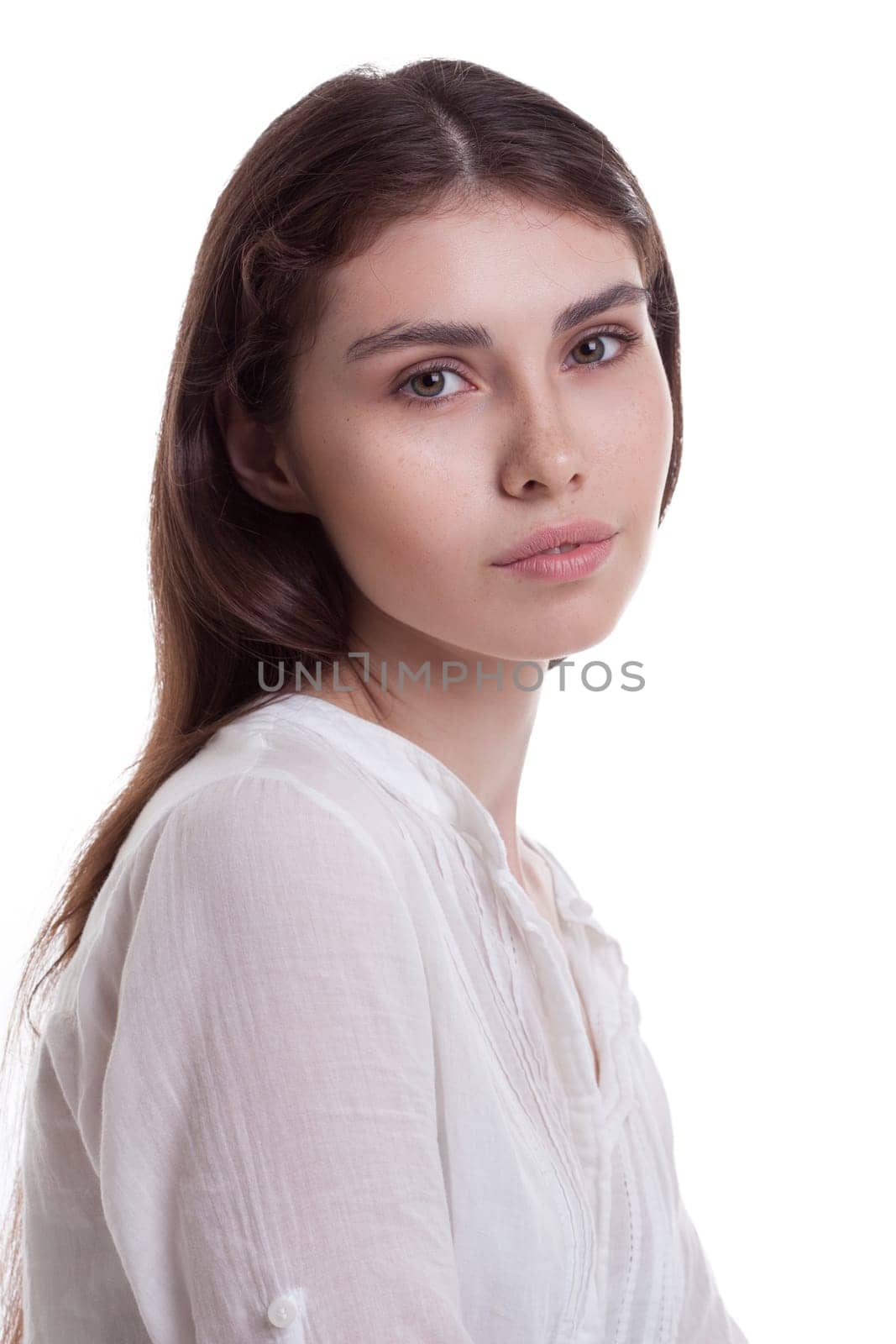 Portrait of young beautiful girl with freckles, isolated on white
