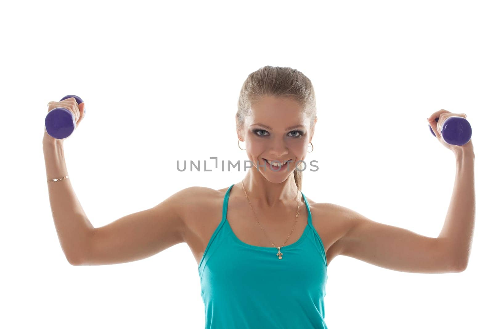 Smiling sporty girl posing with dumbbells, close-up