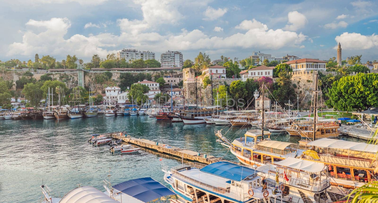 Old town Kaleici in Antalya. Panoramic view of Antalya Old Town port, Taurus mountains and Mediterrranean Sea, Turkey by galitskaya