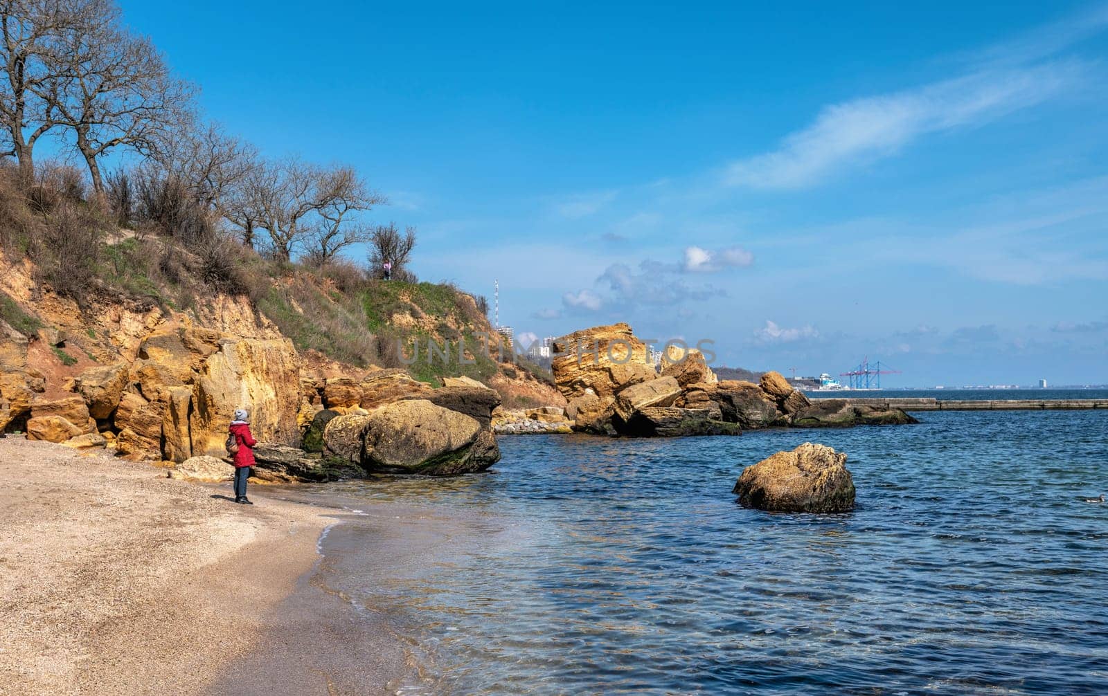 Coast of the Black Sea at the Wild Beach in Odessa, Ukraine, on a sunny spring day