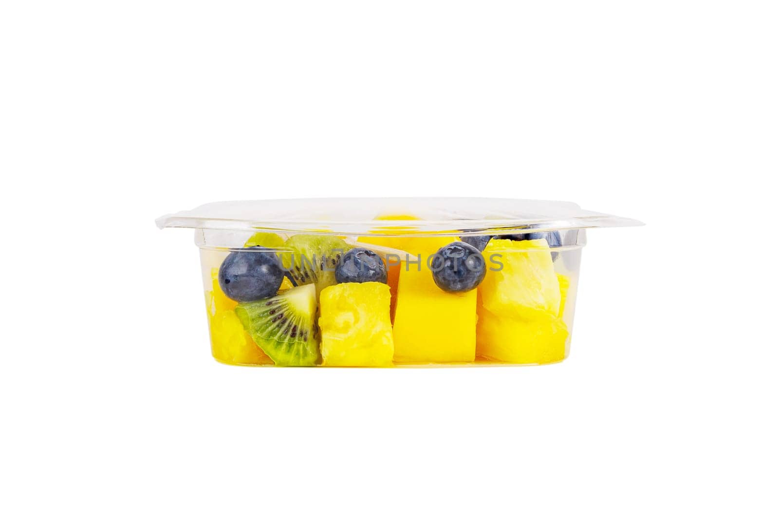 Fruit salad of pineapple, mango, kiwi and blueberries in a plastic container on a white background. High quality photo