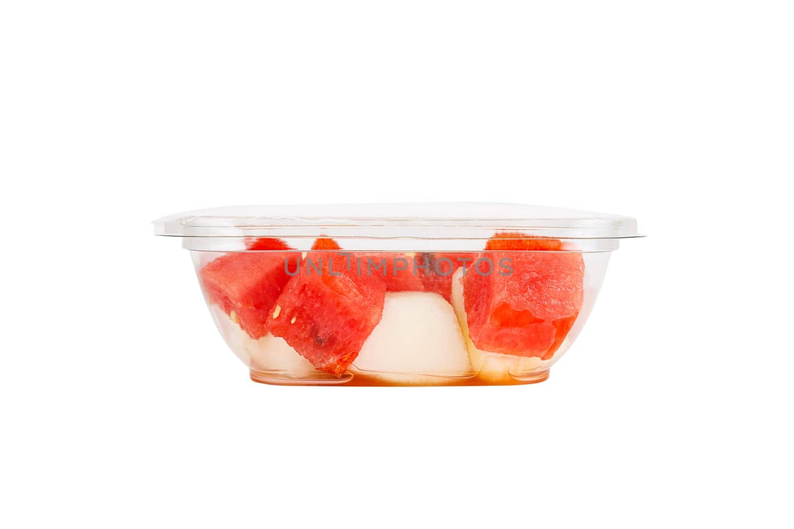 Fruit salad with watermelon and melon in a plastic container on a white background. High quality photo