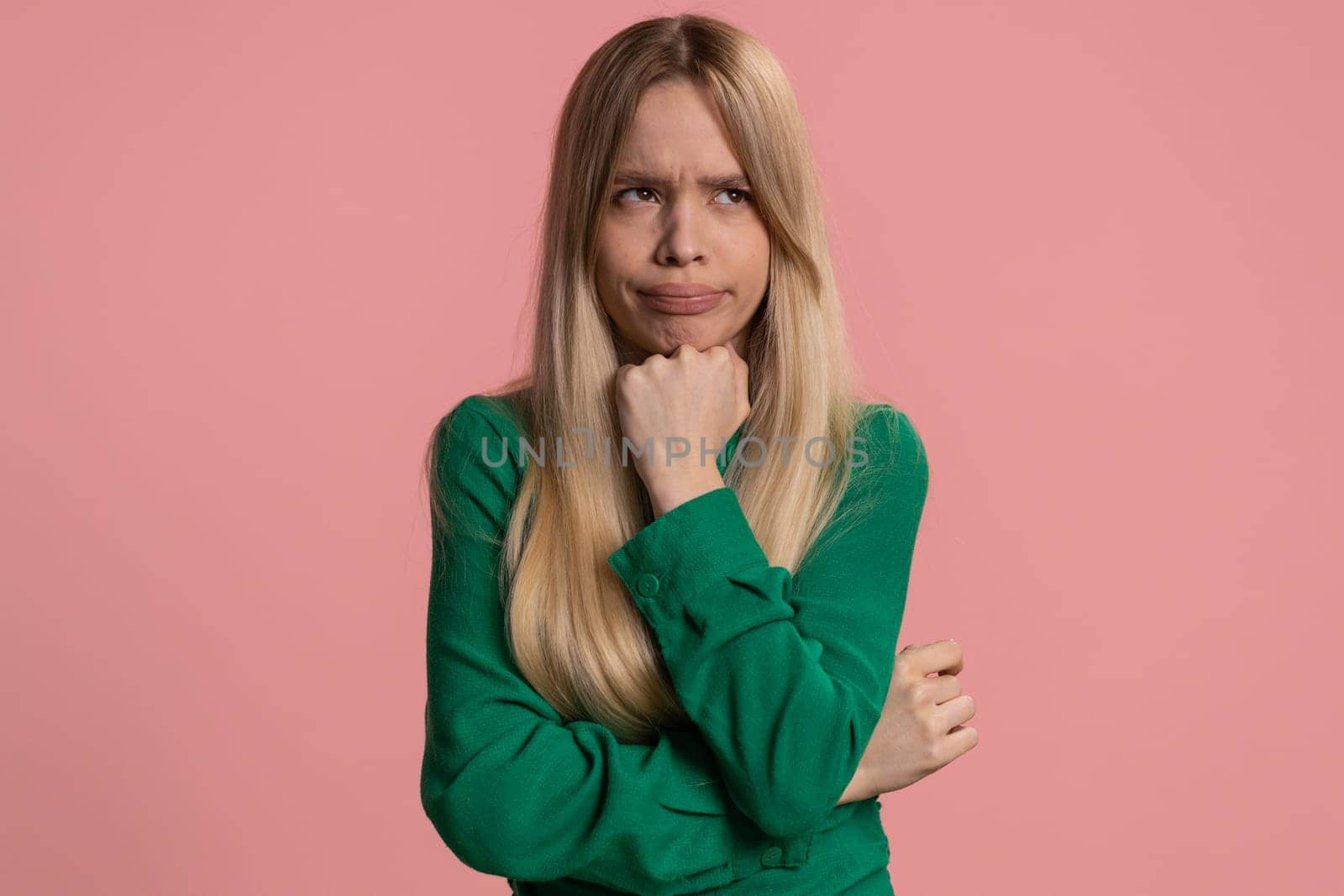 Tired bored caucasian woman indifferent expression, exhausted of tedious story, not interested in communication talk, displeasure, uninteresting. Young teen girl isolated on pink studio background