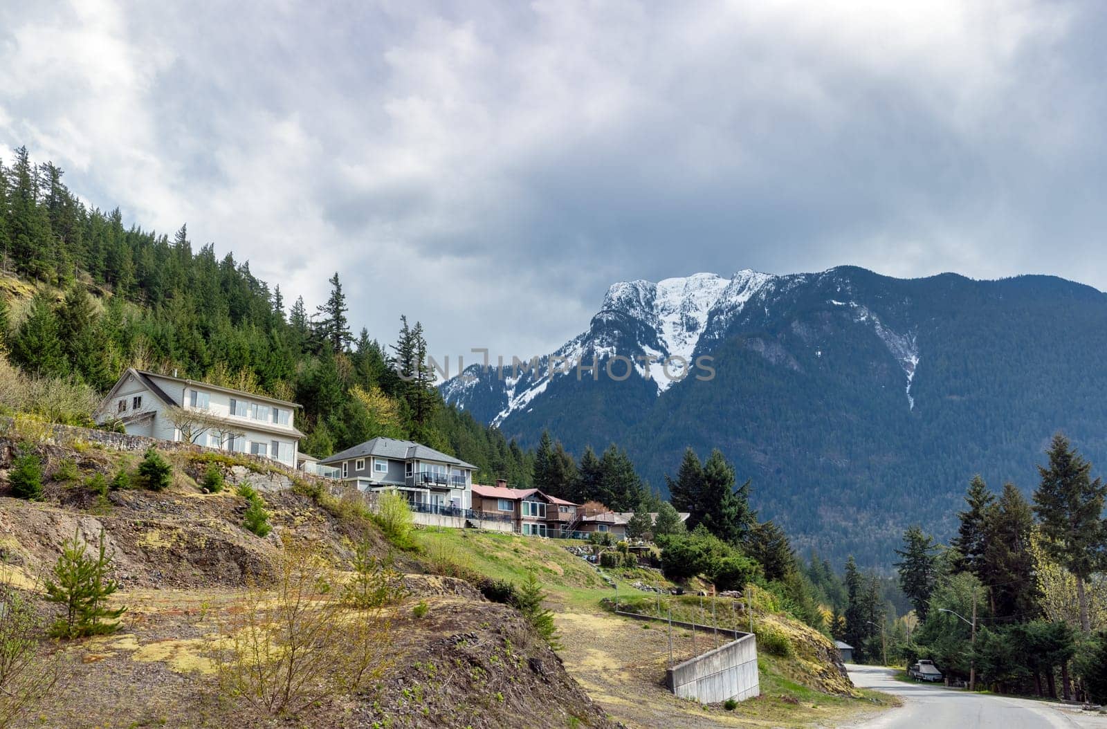 A perfect neighbourhood. Residential street and mountain view in Hope, British Columbia.