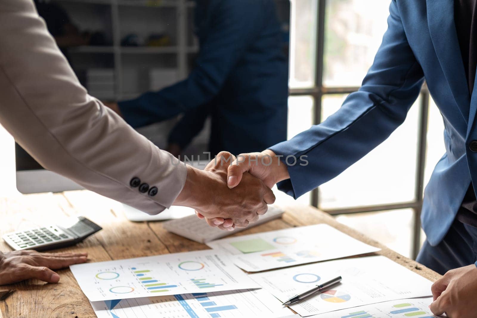 business officer engineer shaking hand each other, finishing up meeting deal plan condition, Successful business. High quality photo