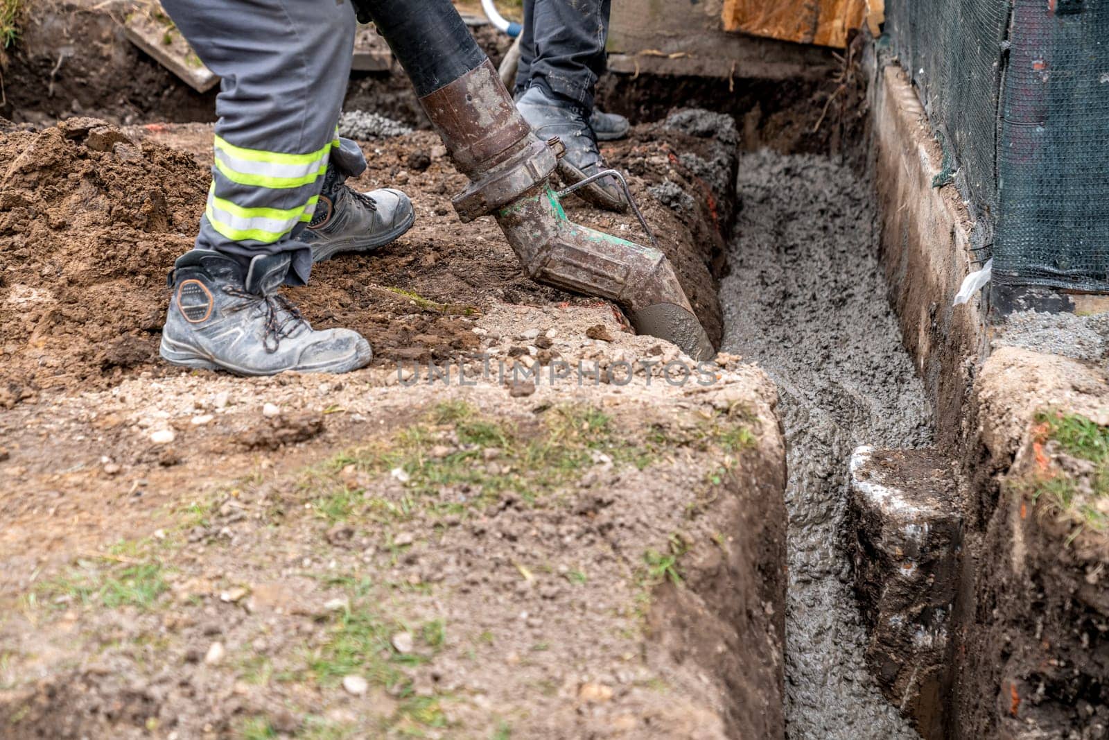 concrete in the ground for the foundation of the building. High quality photo